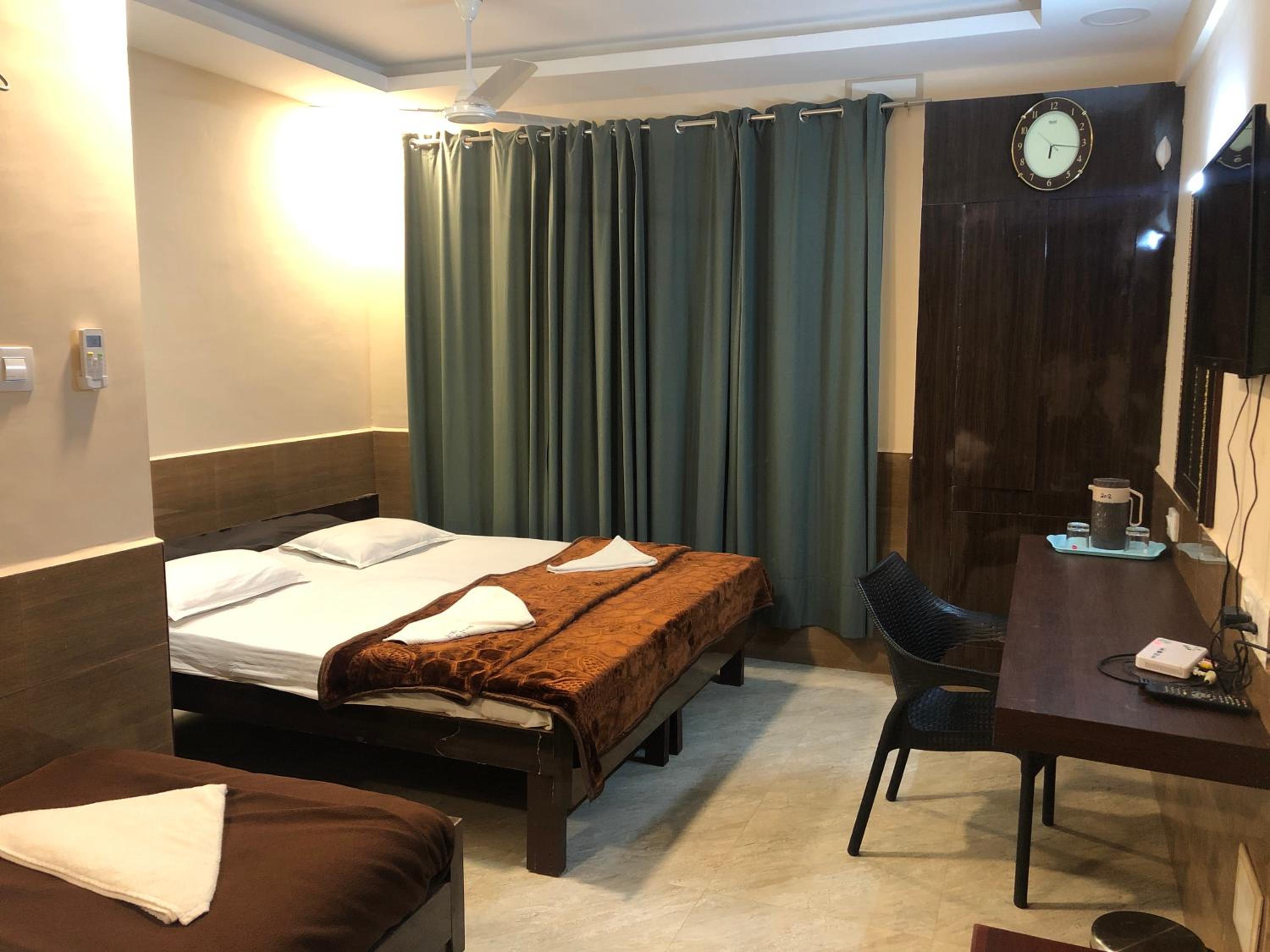 Deluxe Triple Room - Photo 1