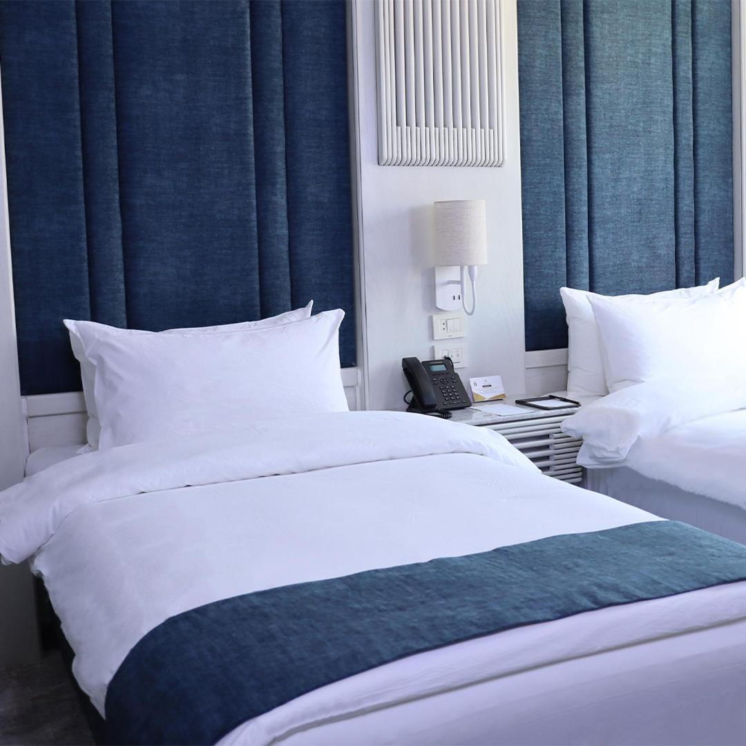 Twin Room - Photo 1