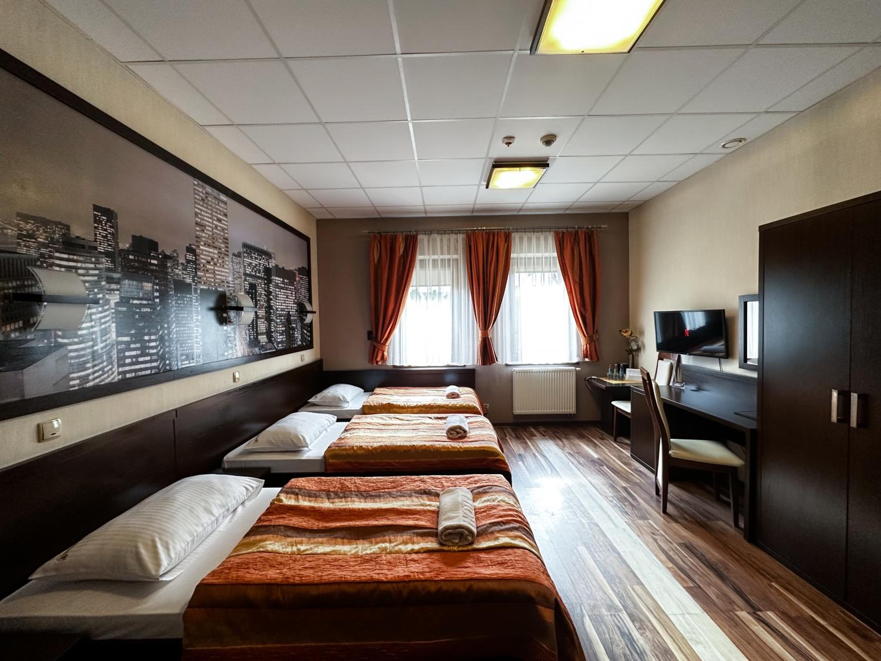 Triple Room - Photo 1