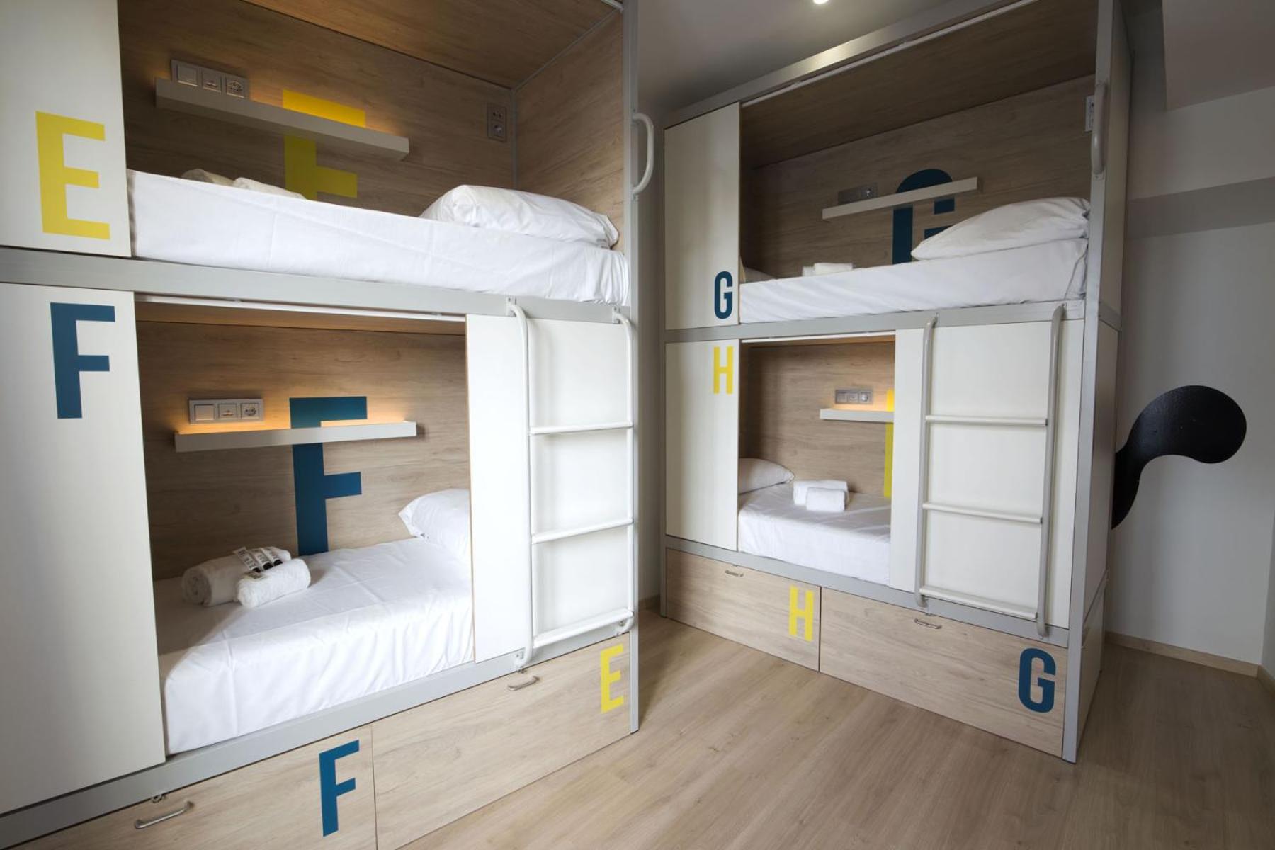 Cama en habitación compartida para 8 personas