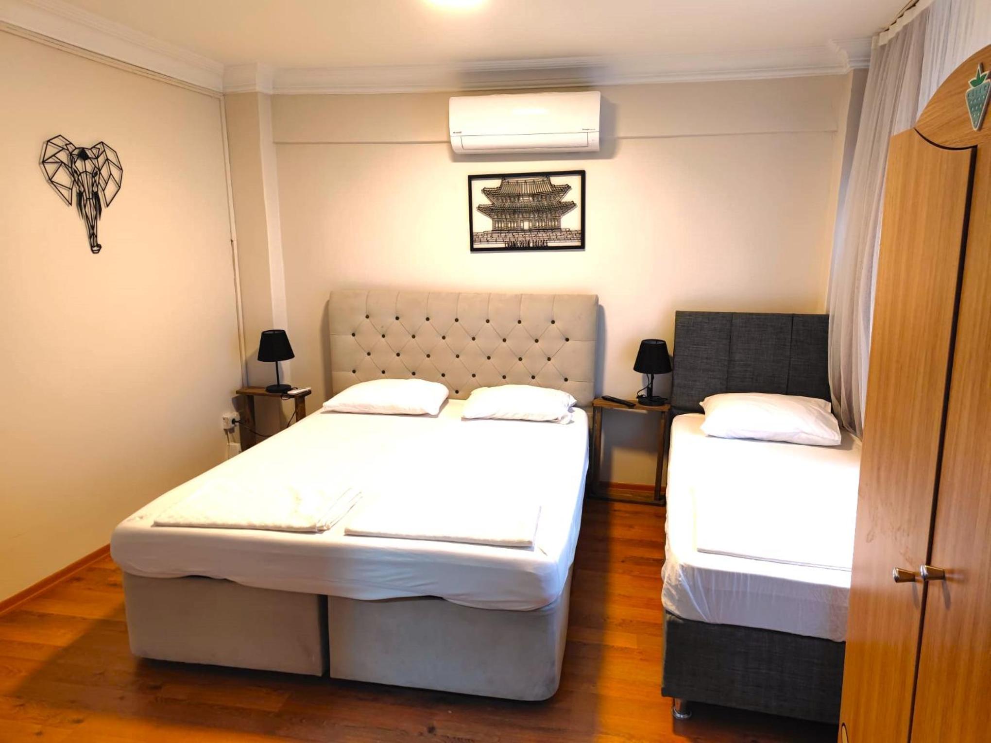 Comfort Triple Room with Shower photo 3