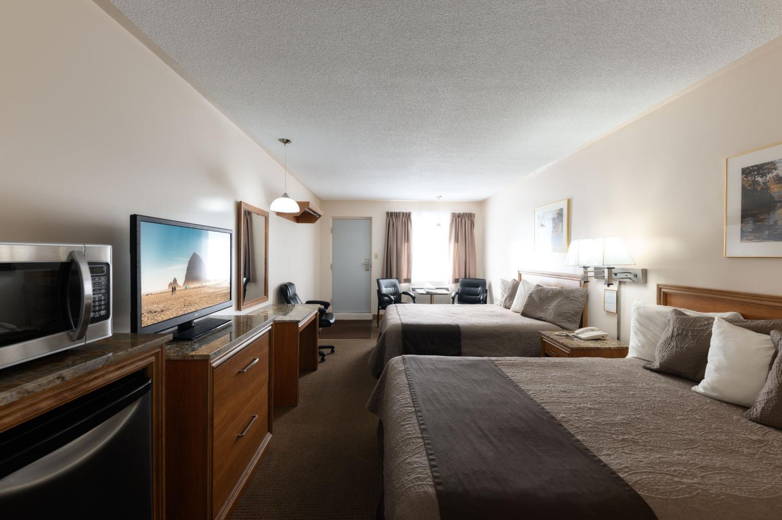 Queen Room with Two Queen Beds - Photo 1