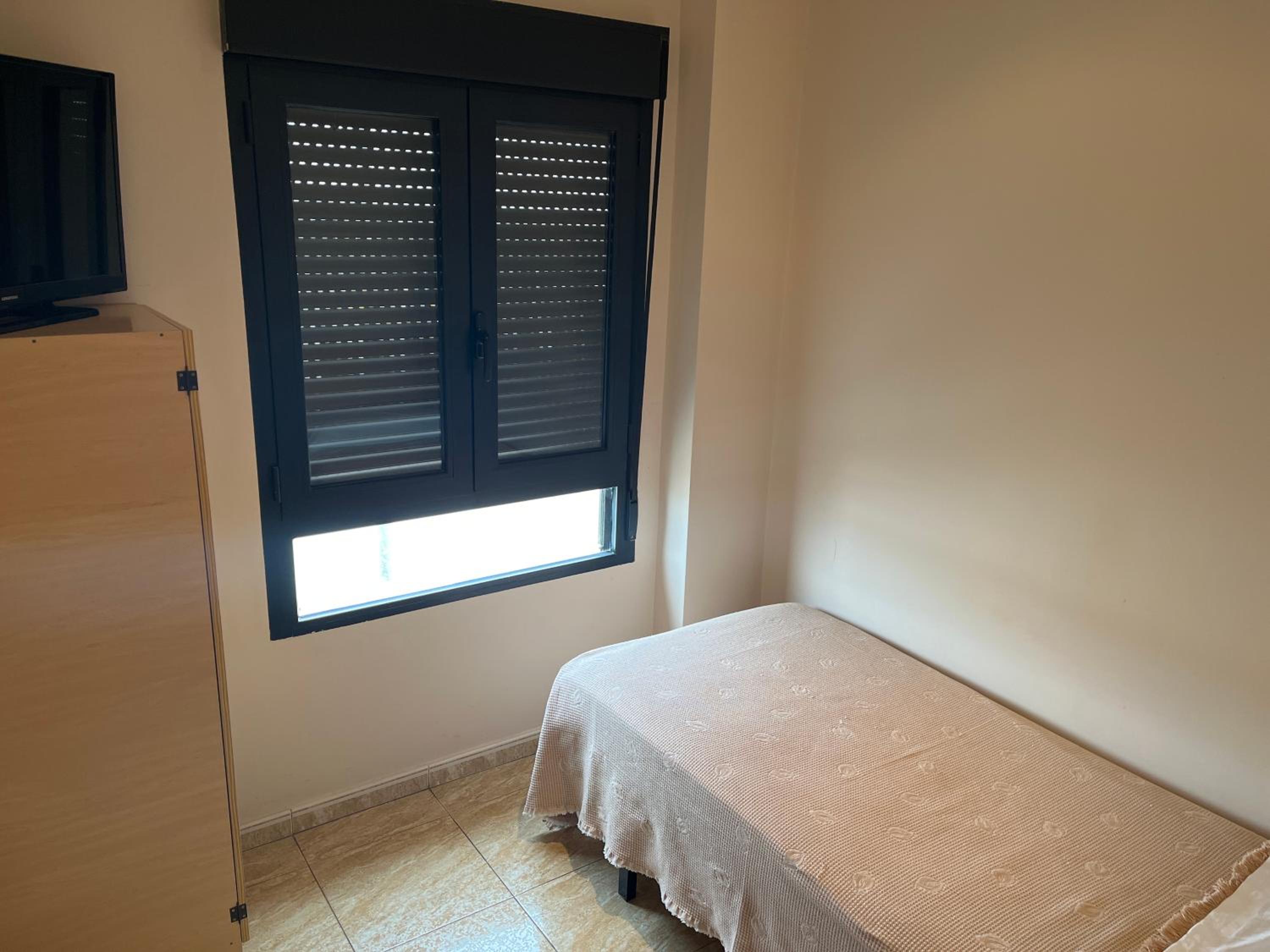 Habitación individual con baño privado