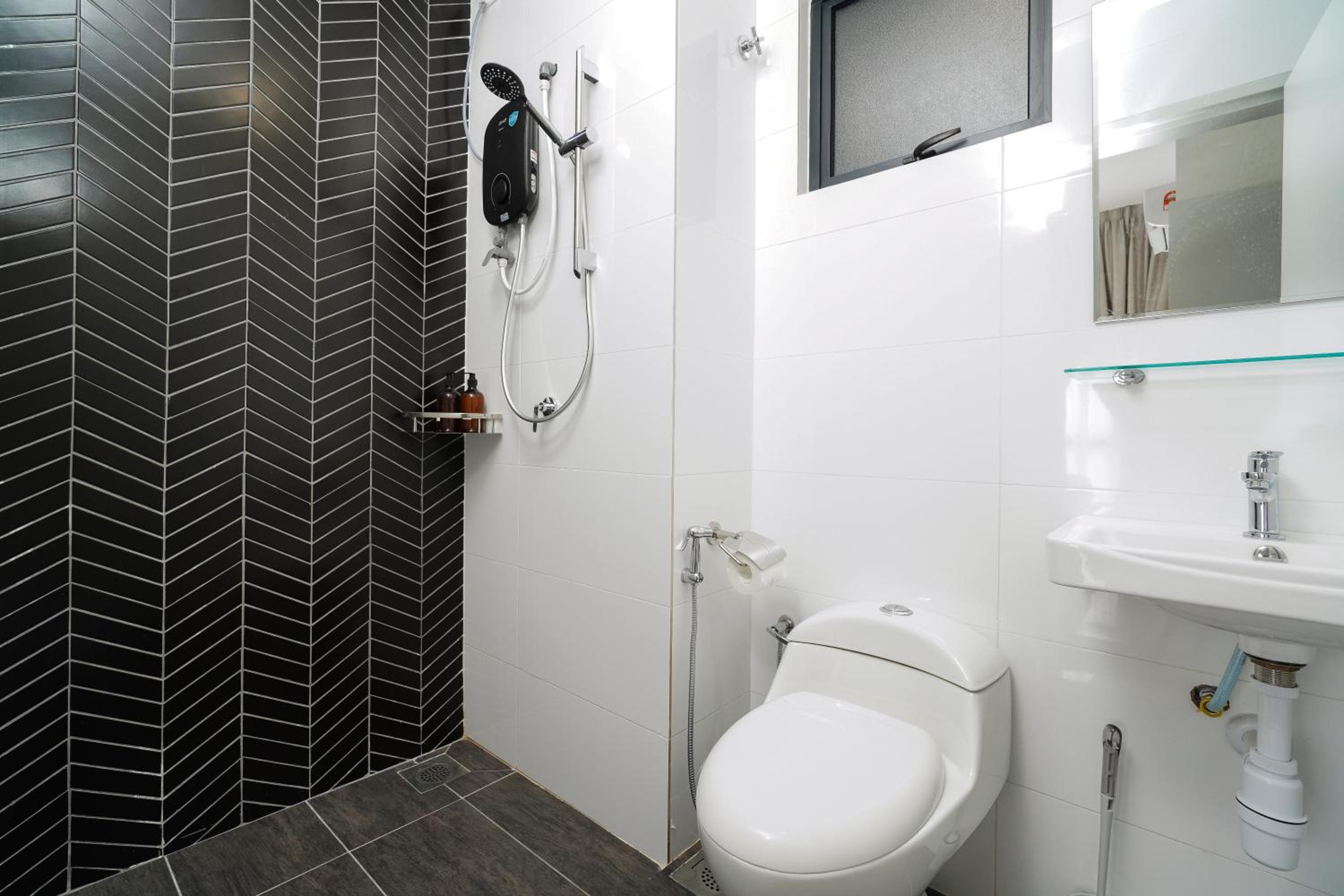 Three-Bedroom Apartment - Photo 10