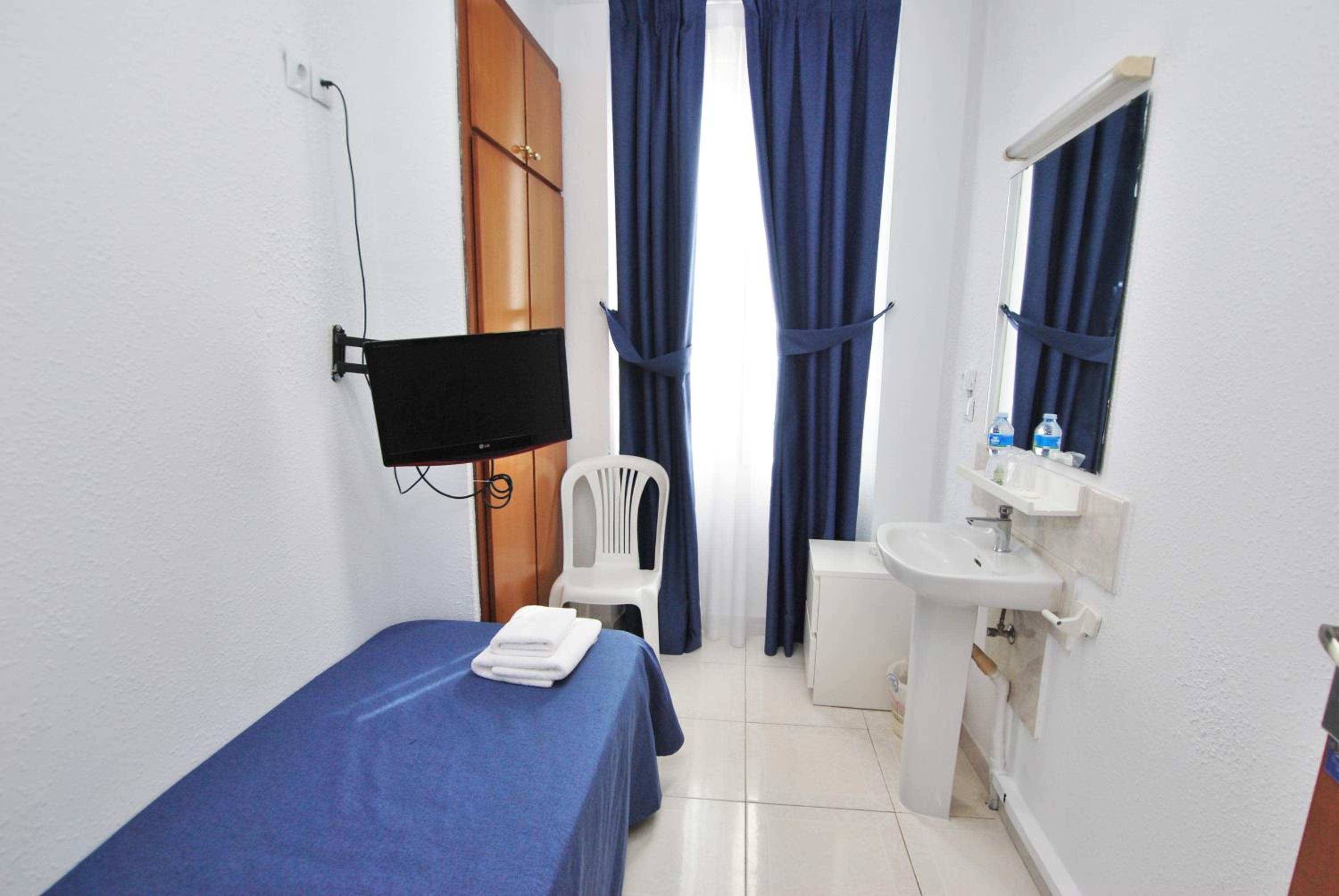 Habitación individual con baño compartido