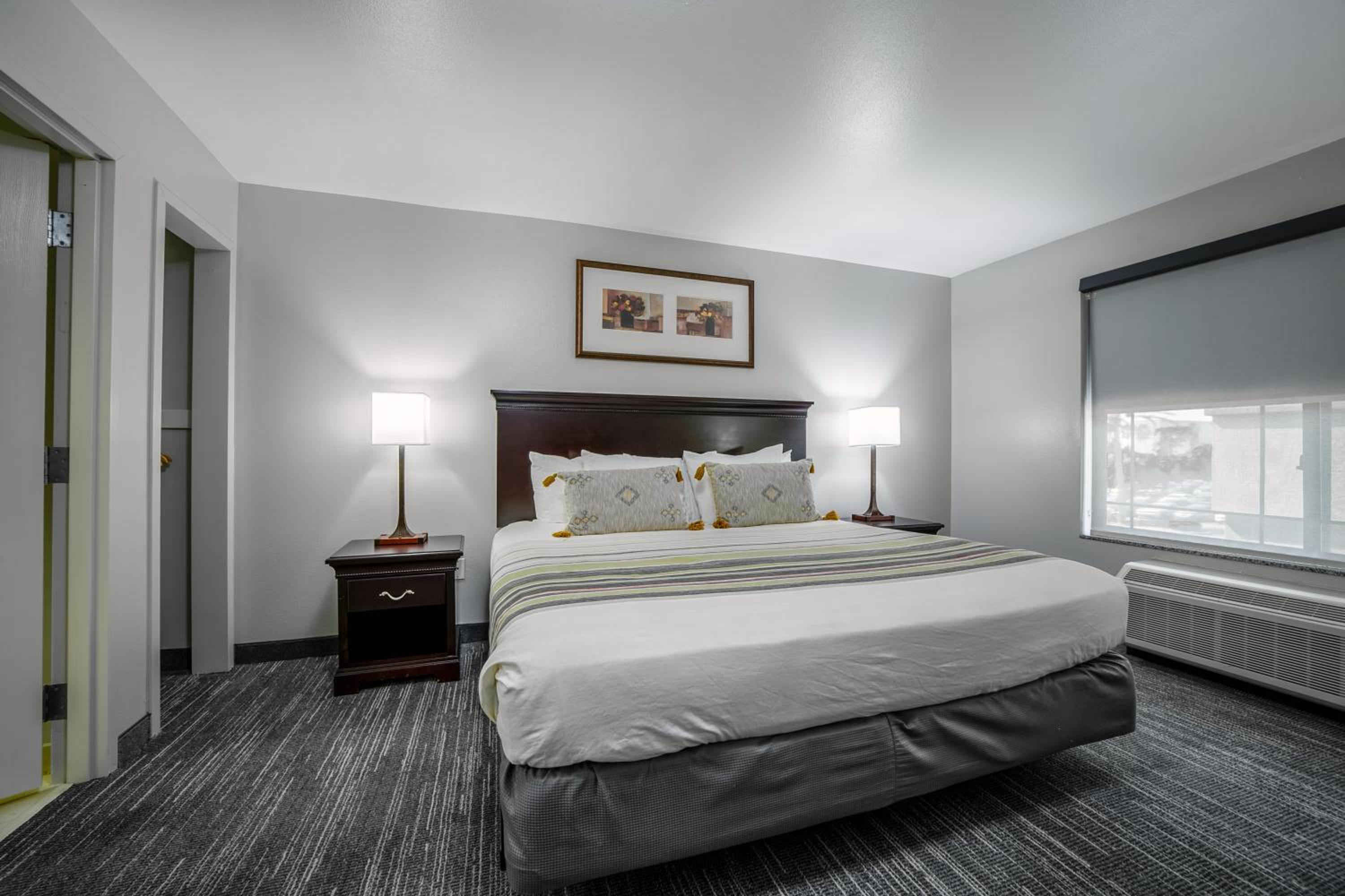 Extended Stay Suite with One King Bed and Pull-out Sofa - Non-Smoking - Photo 1