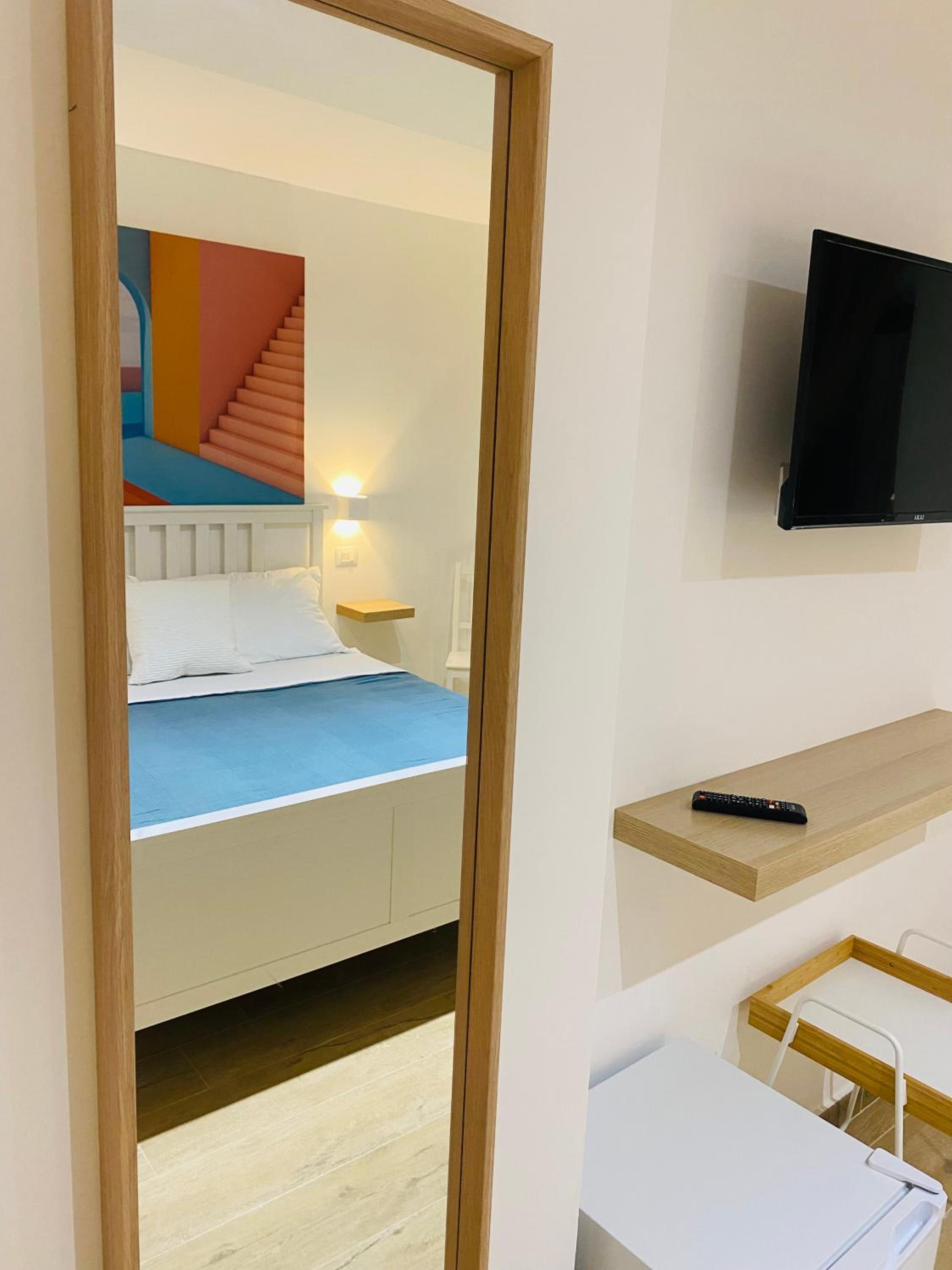 Deluxe Quadruple Room - Photo 9