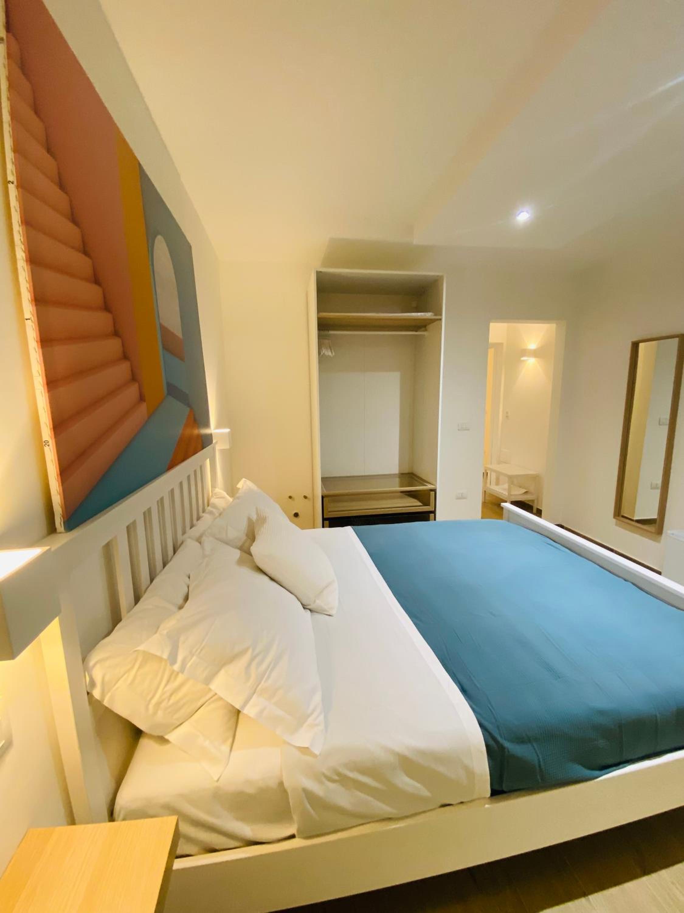 Deluxe Quadruple Room - Photo 13