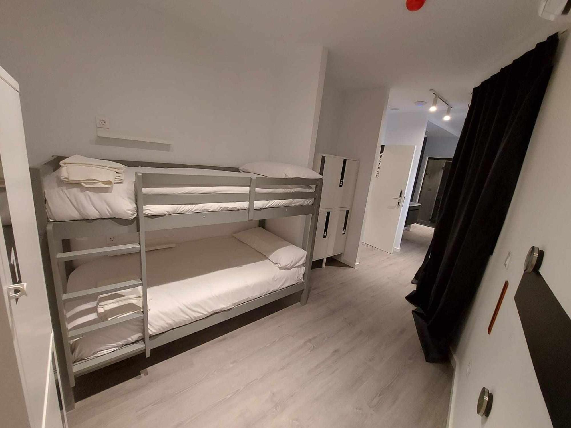 Single Bed In Dormitory Room