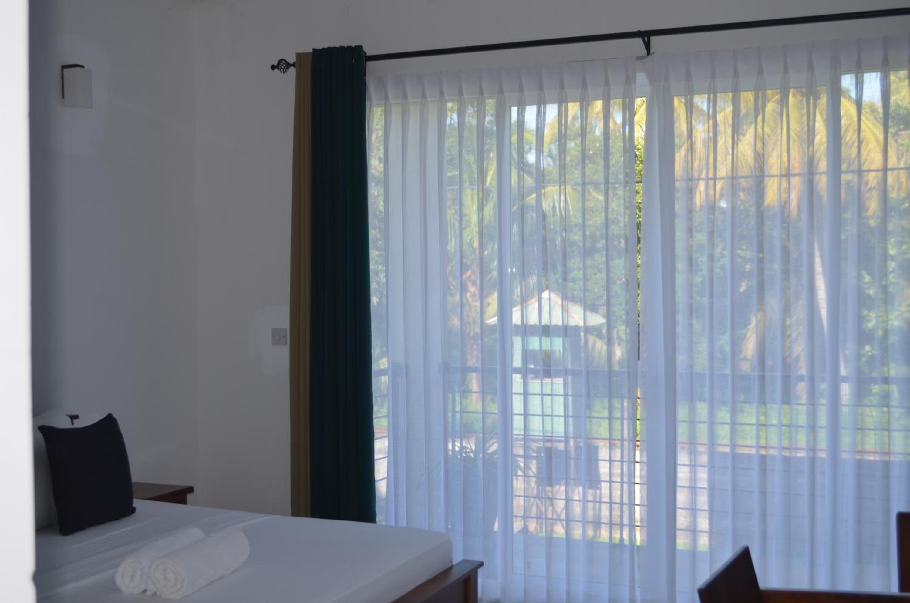 Deluxe Double Room (2 Adults + 1 Child) photo 2