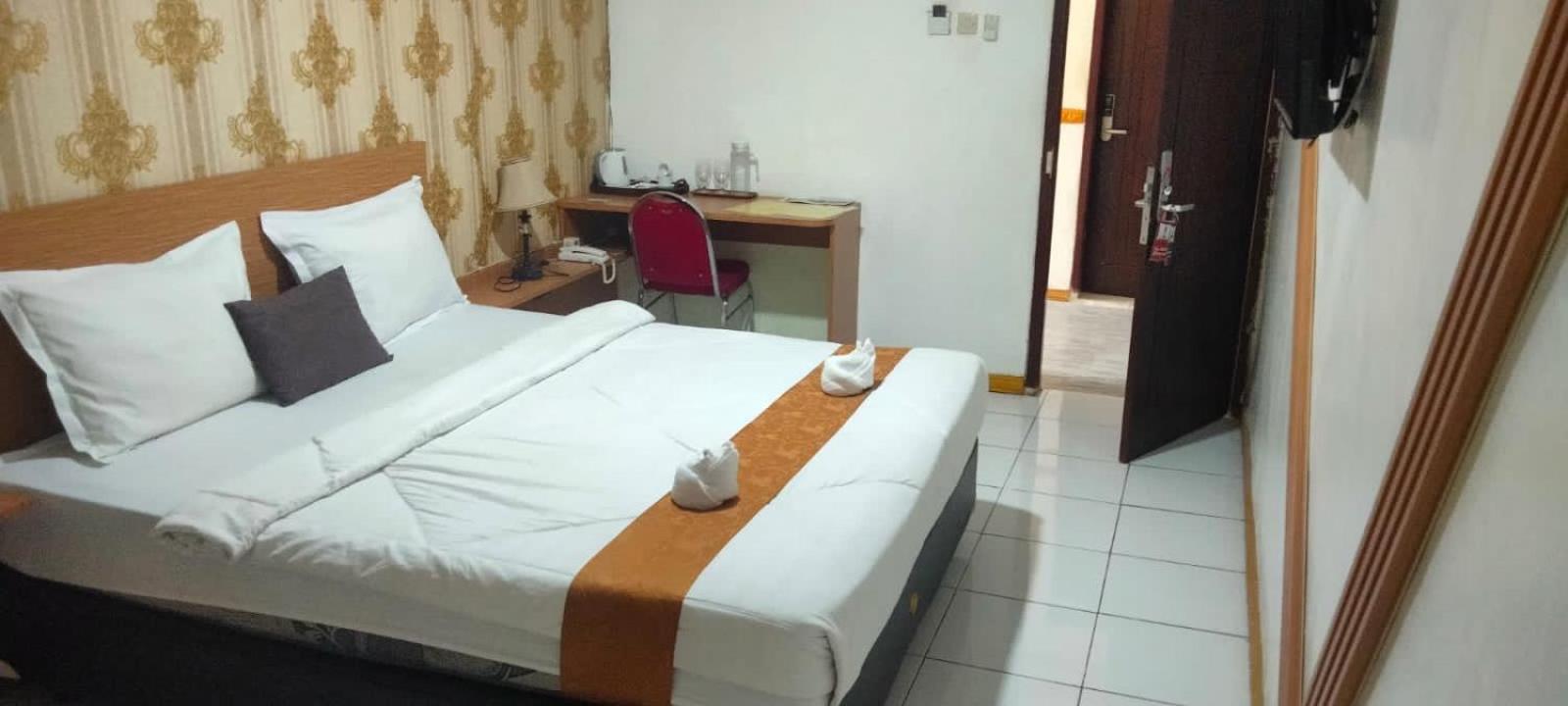 Deluxe Room - Photo 1