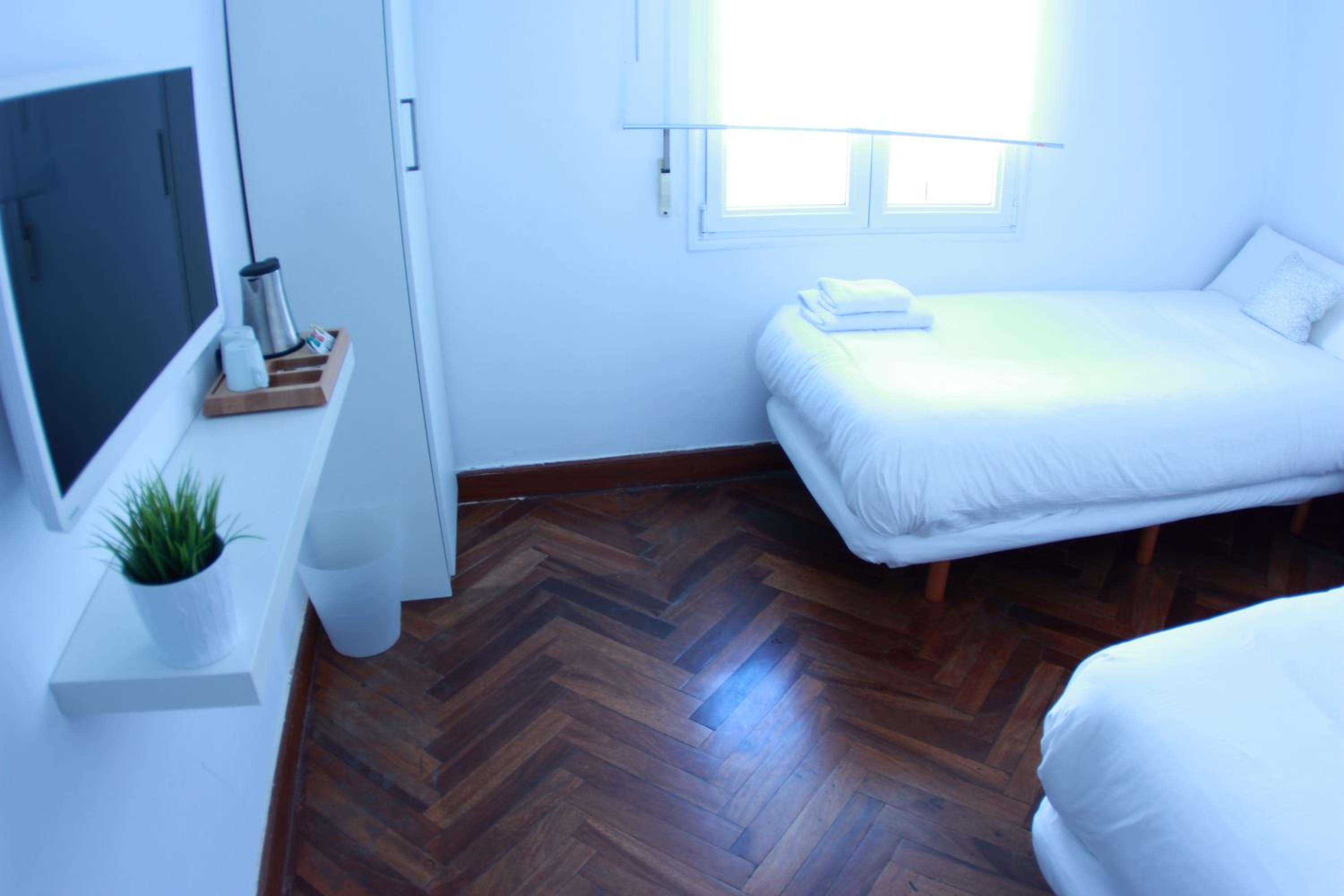 Habitación Doble con Baño Compartido