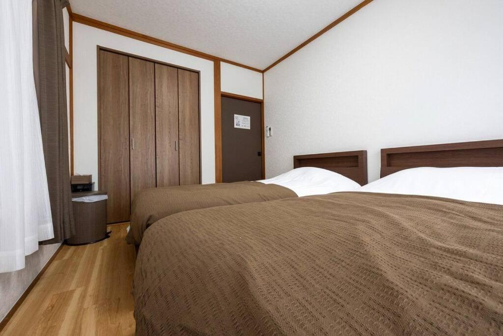 Three-Bedroom Apartment photo 1