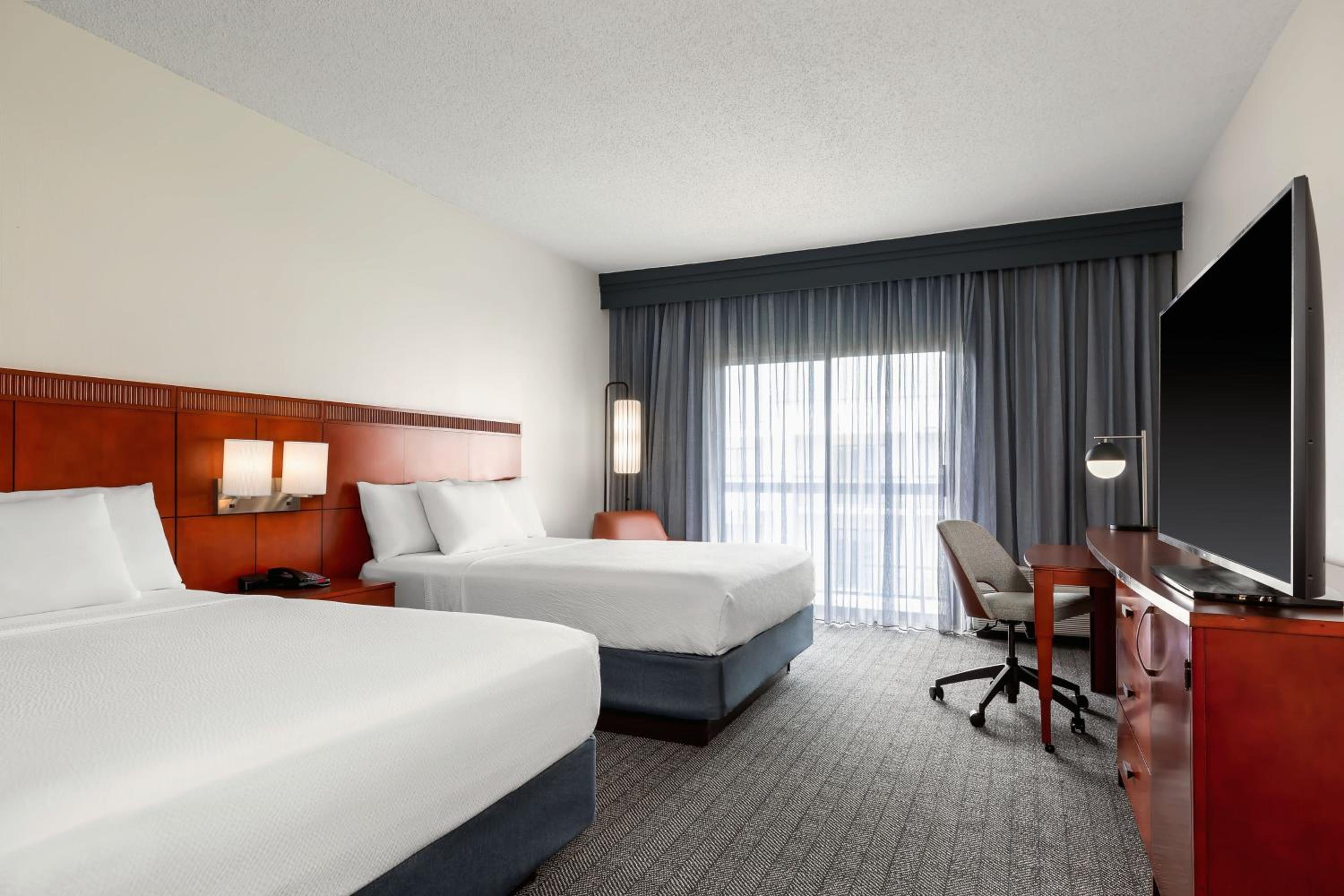 Queen Room with Two Queen Beds - Photo 1