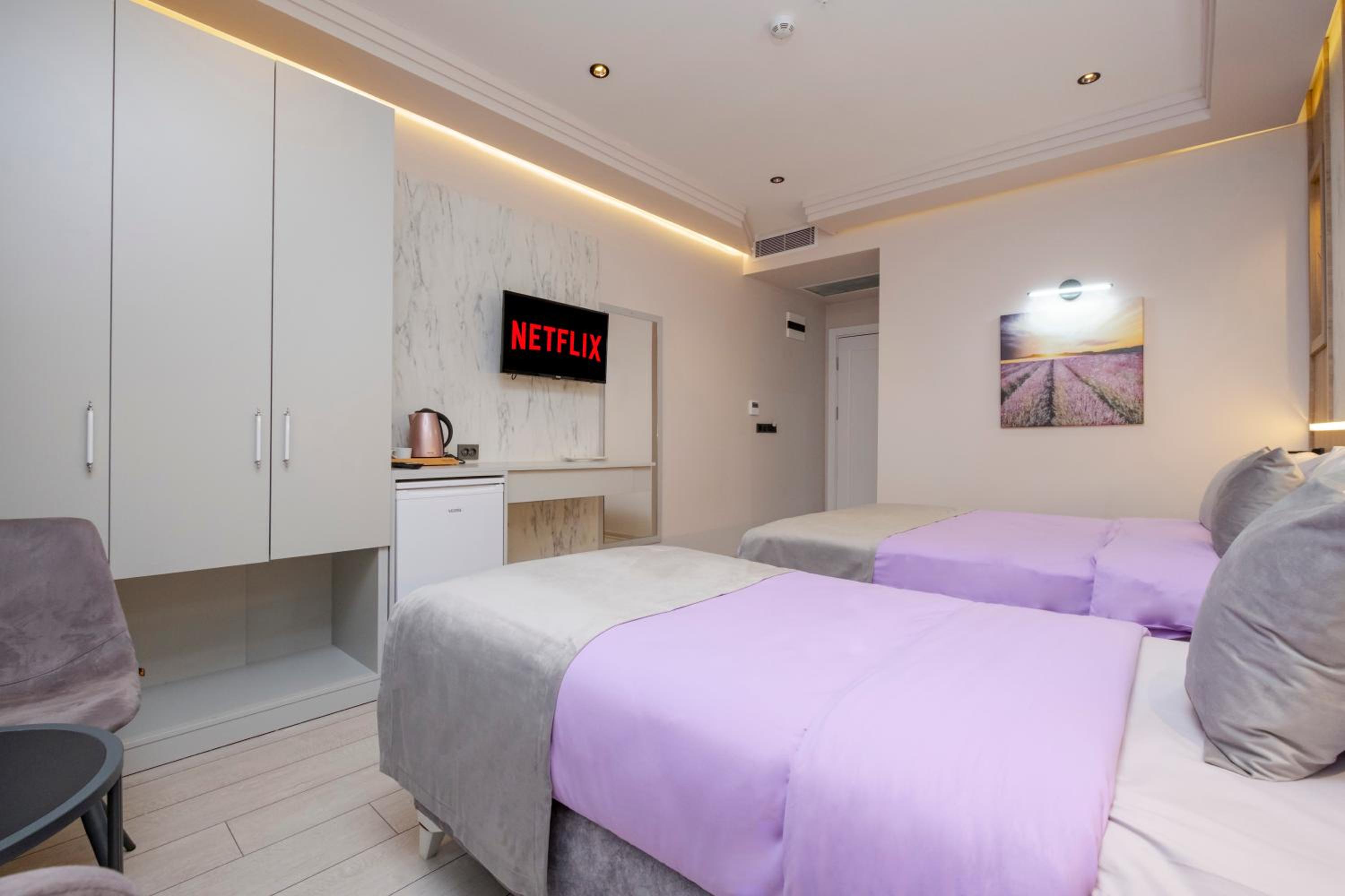 Deluxe Triple Room - Photo 4