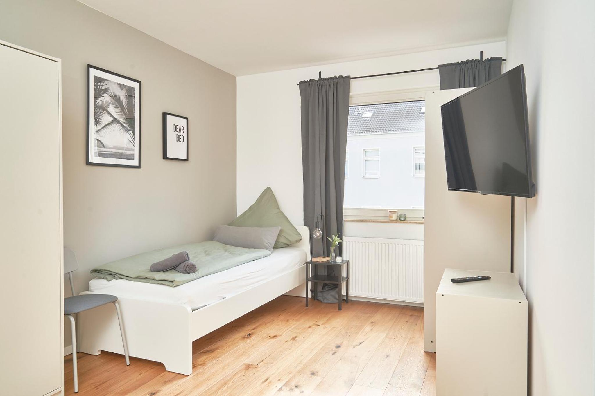 Three-Bedroom Apartment photo 1