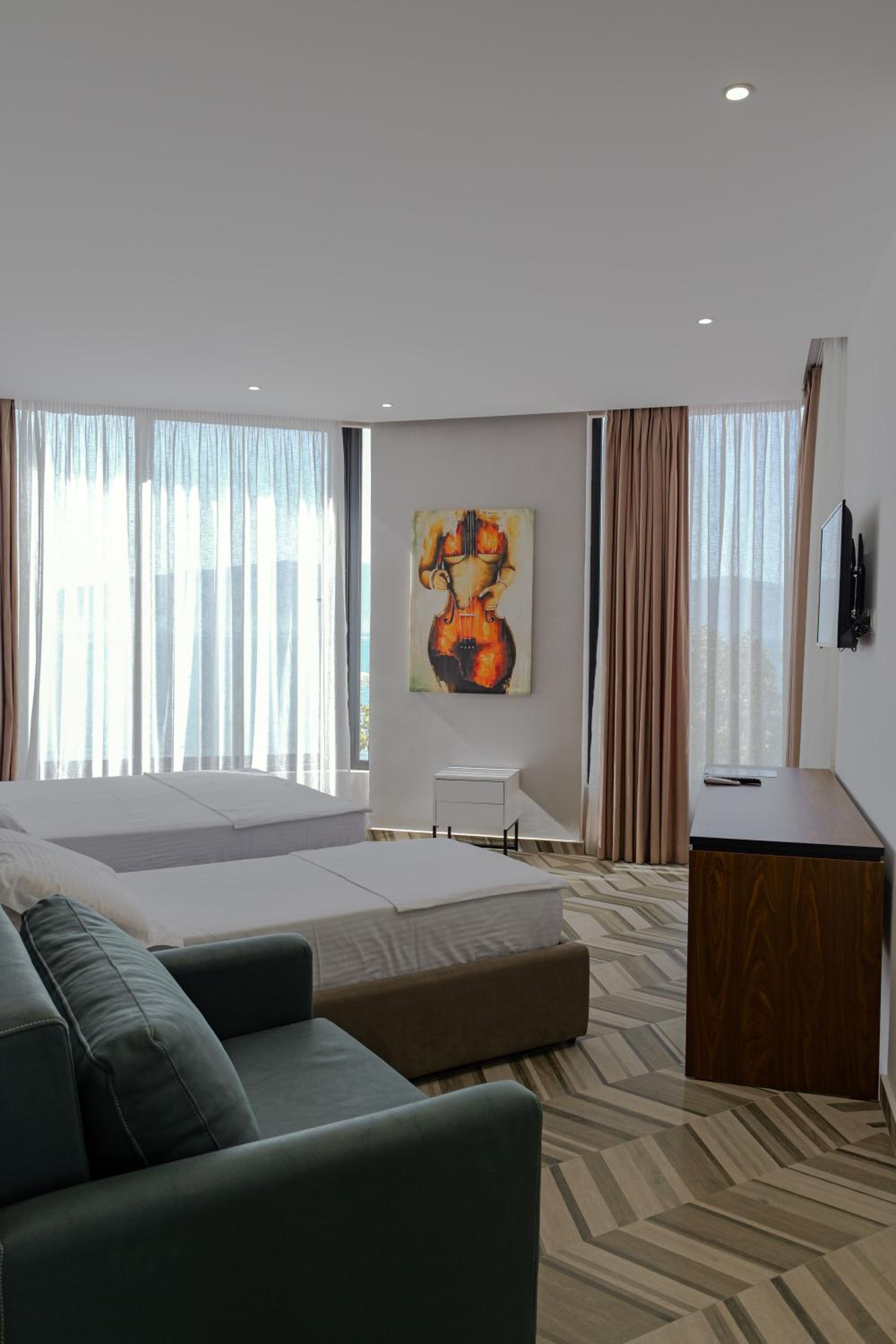 Deluxe Triple Room with Sea View
