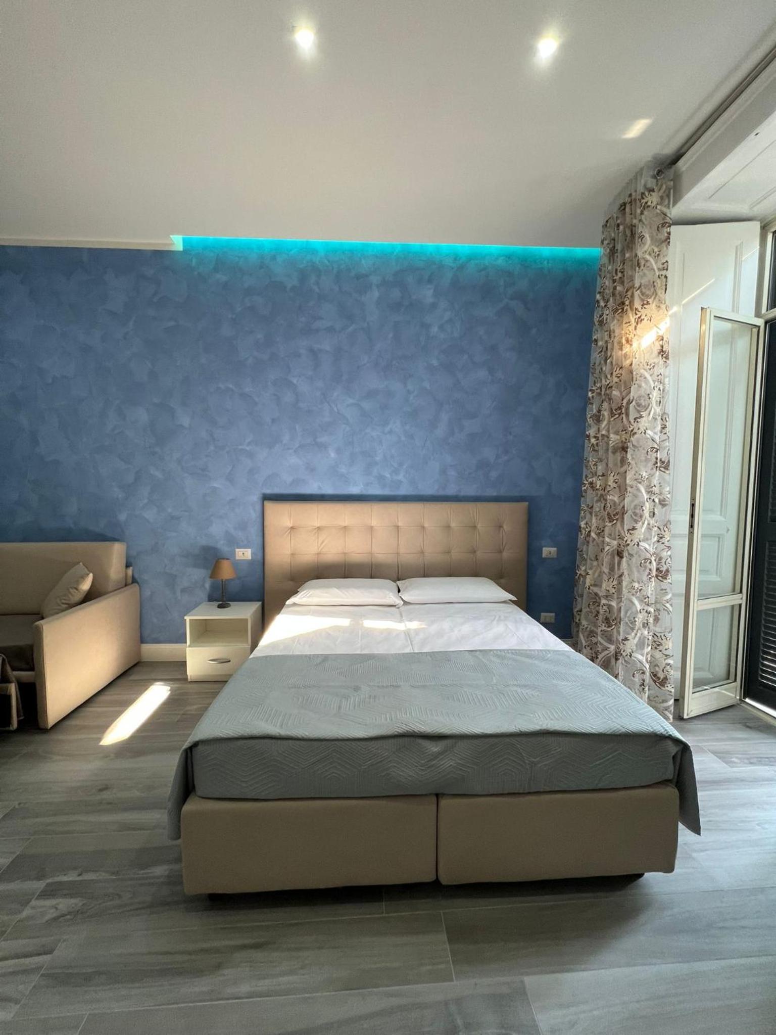Quadruple Room with Balcony