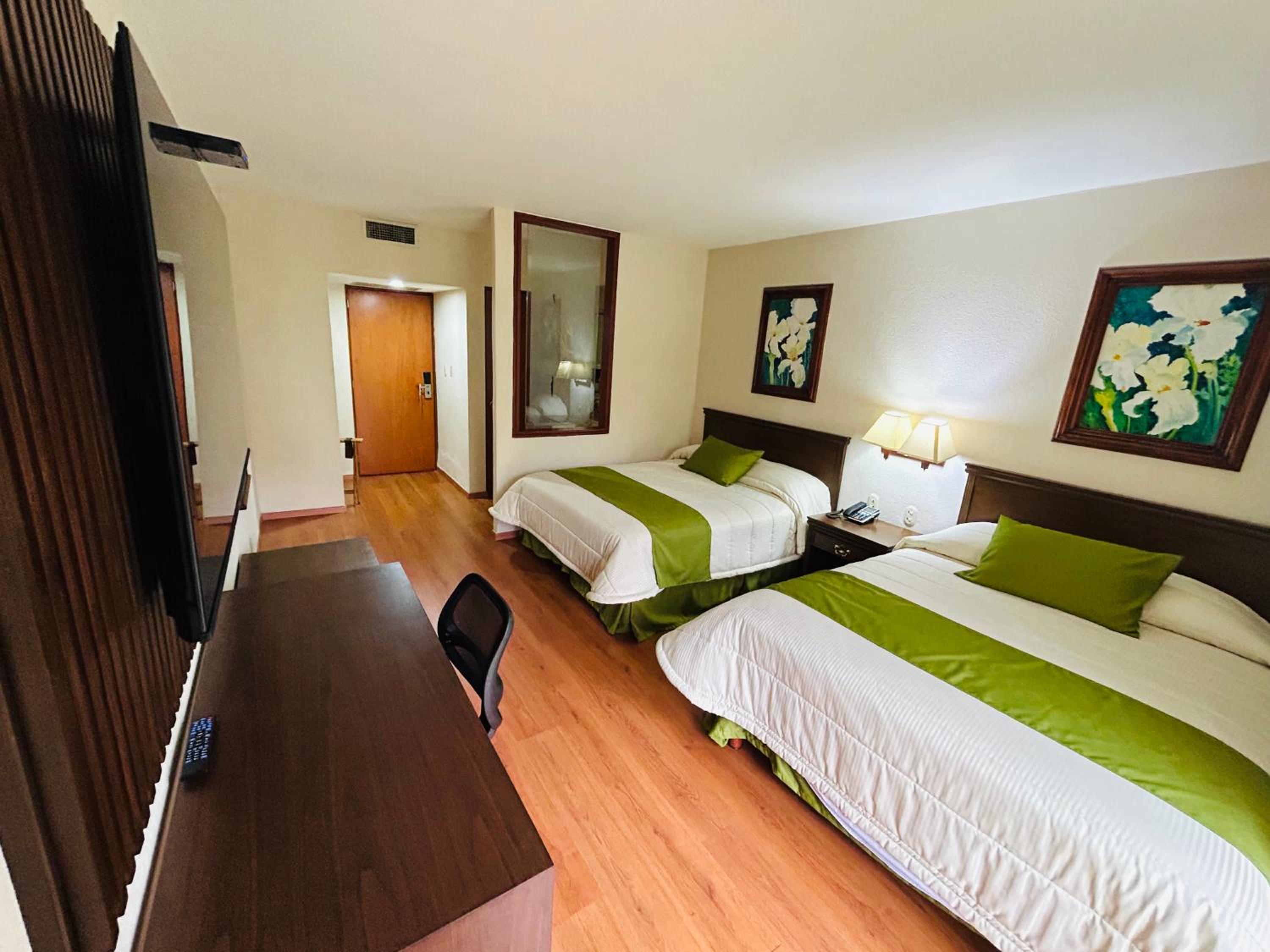 Queen Room with Two Queen Beds - Photo 3