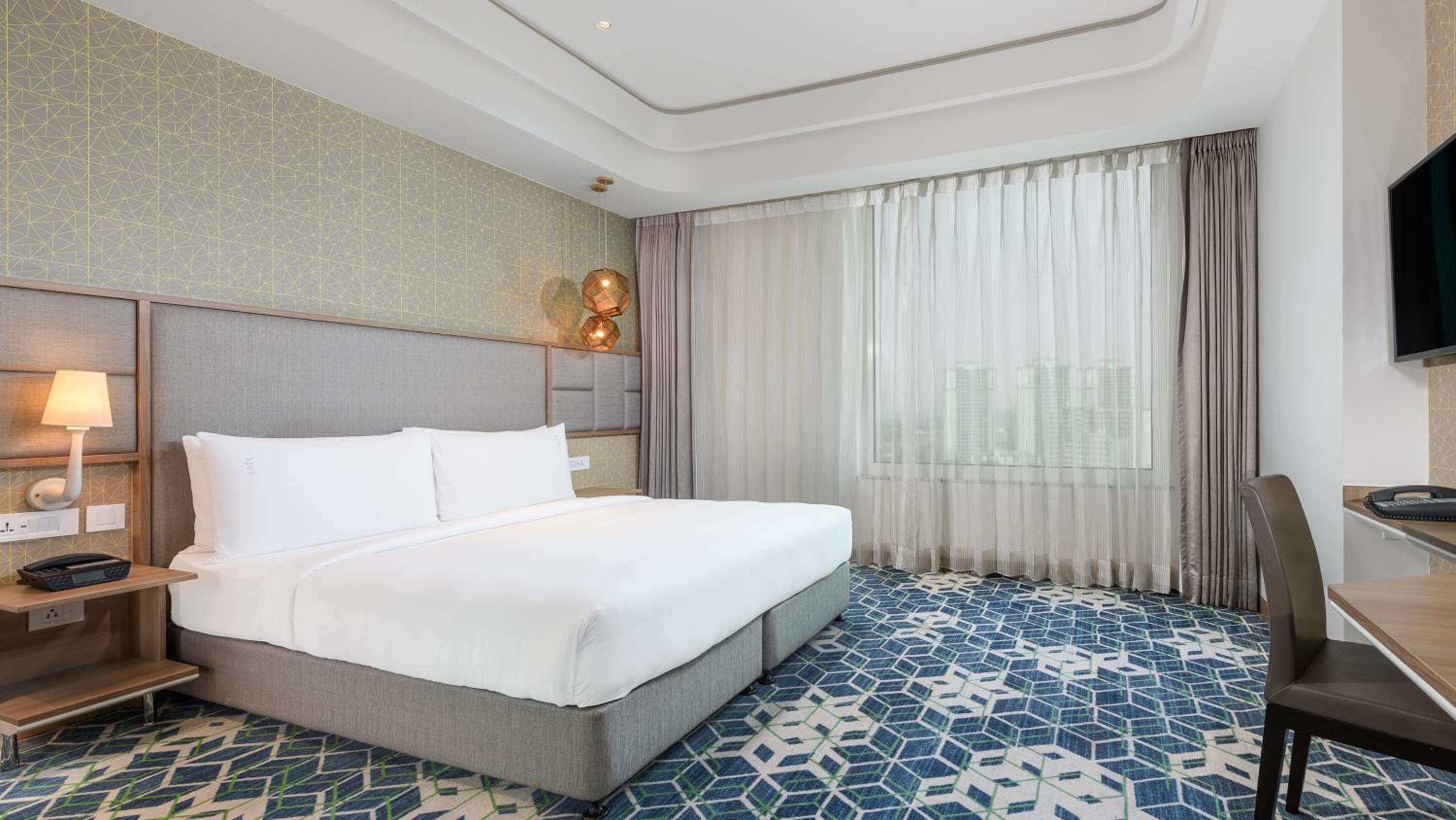 Standard King Room with City View - High Floor - Photo 1