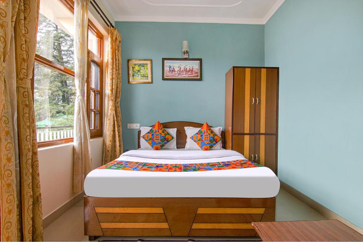 Deluxe Room - Photo 1