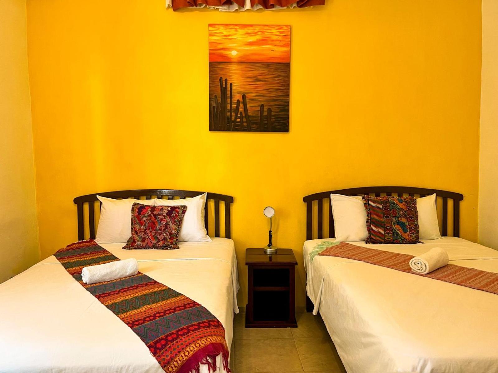 Standard Queen Room with Two Queen Beds photo 2