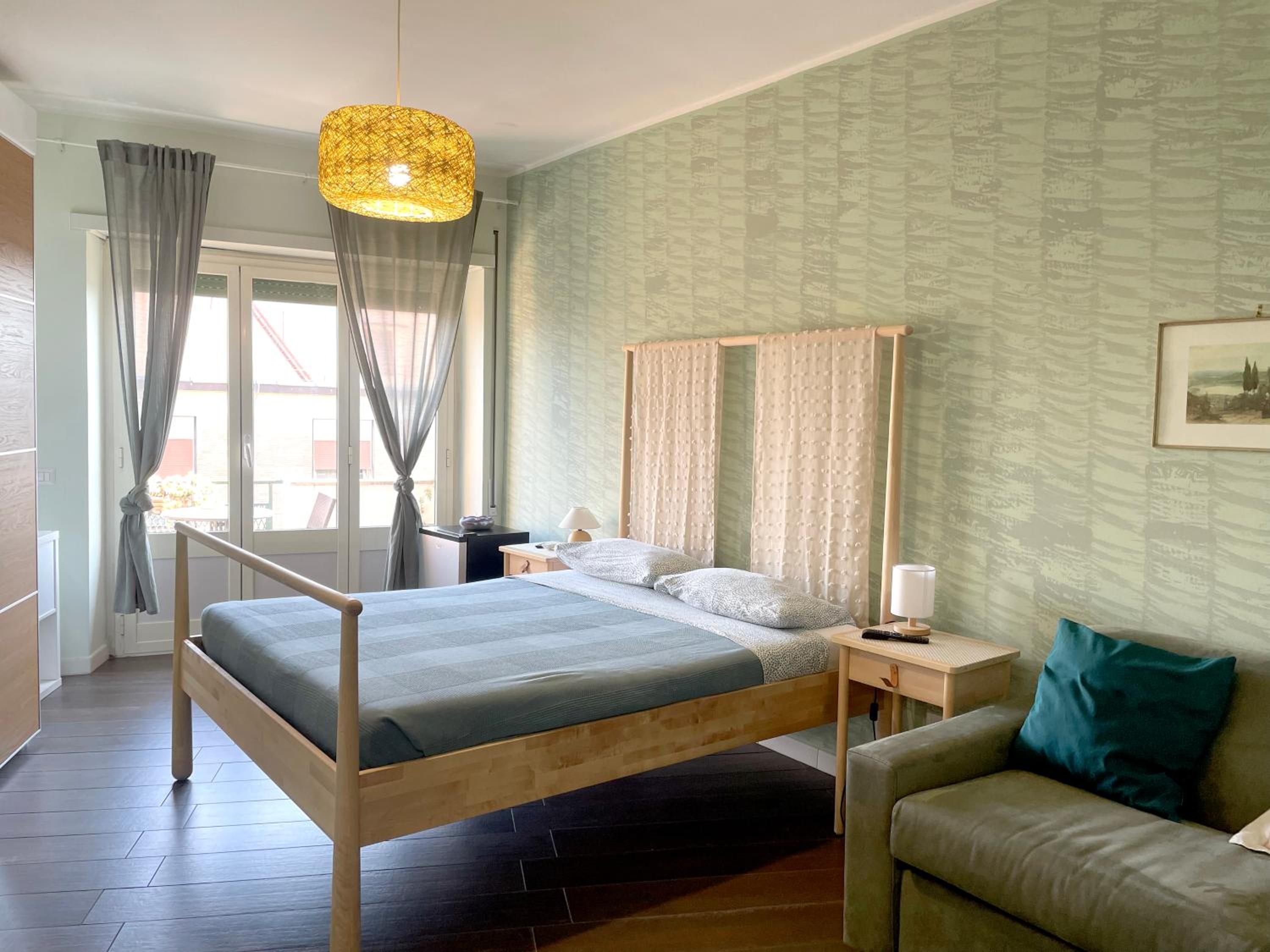 Quadruple Room with Private Bathroom