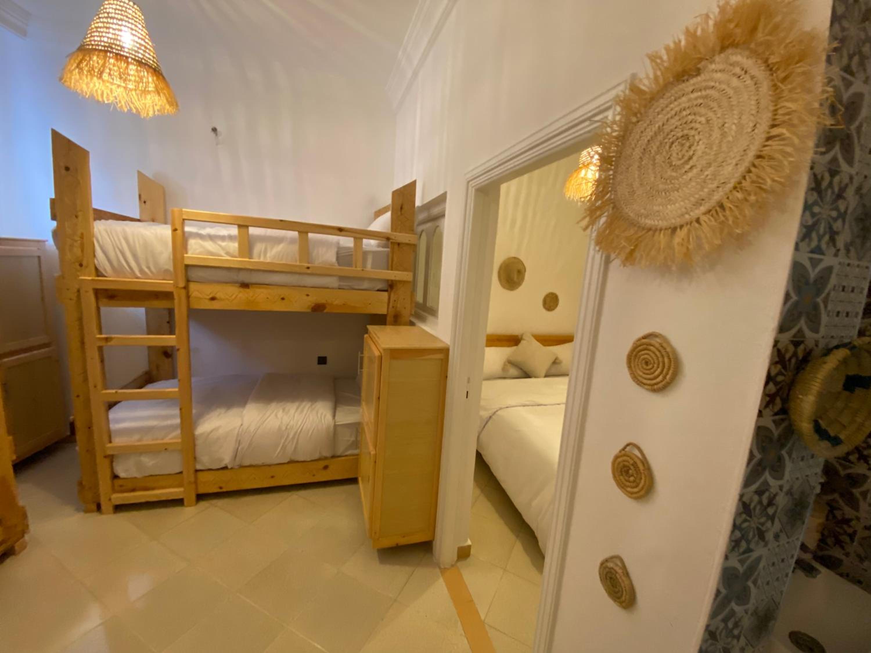 Single Bed in Dormitory Room