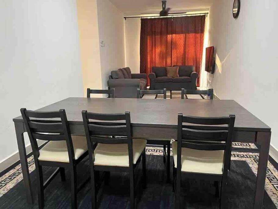 Three-Bedroom Apartment photo 1