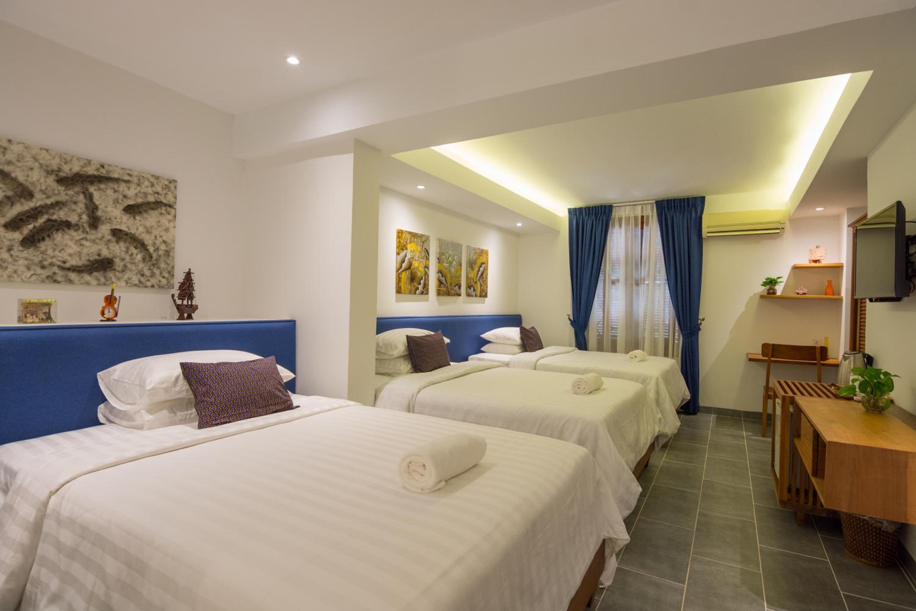 Deluxe Triple Room - Photo 2