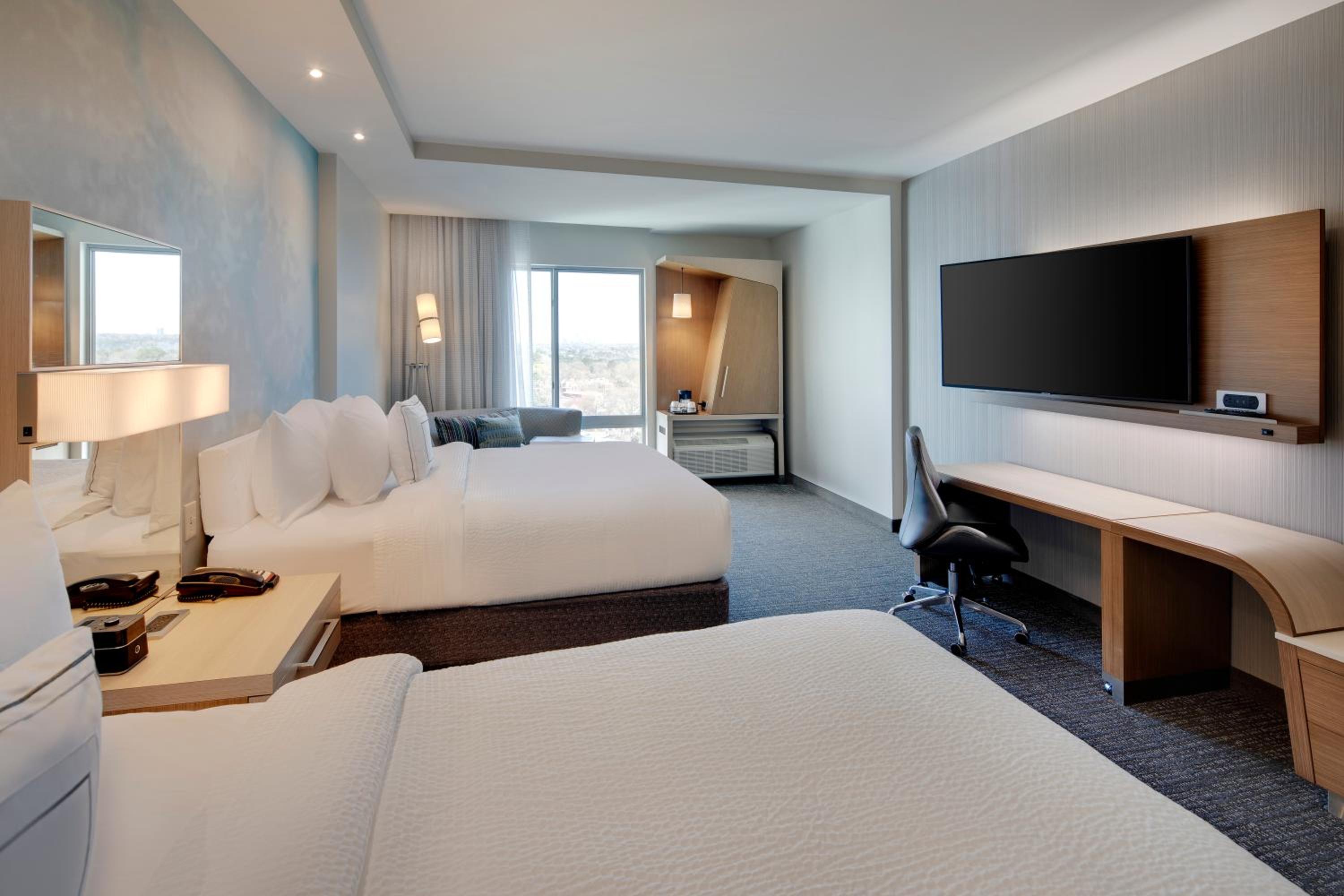 Queen Room with Two Queen Beds - Hearing Accessible - Photo 1