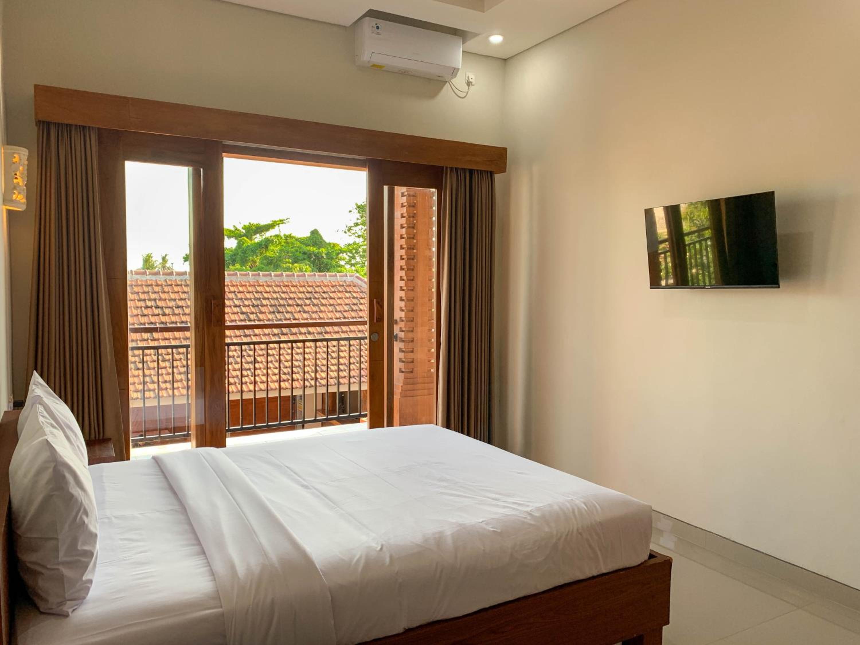 Deluxe Double Room - Photo 11