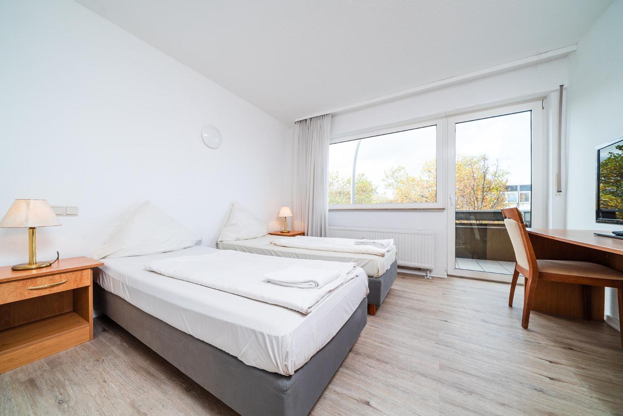 Twin Room - Photo 1