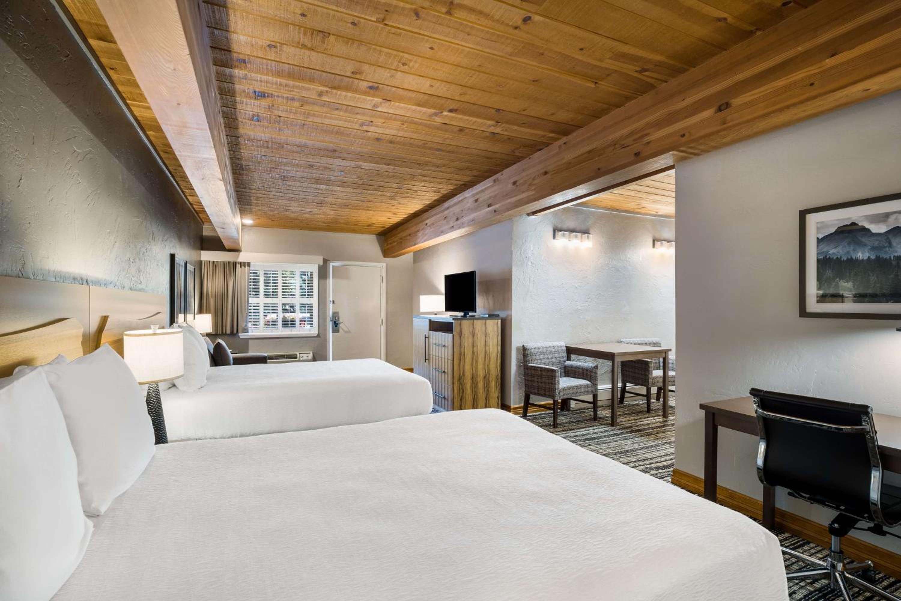Queen Room with Two Queen Beds and Sofa Bed - Non-Smoking photo 1