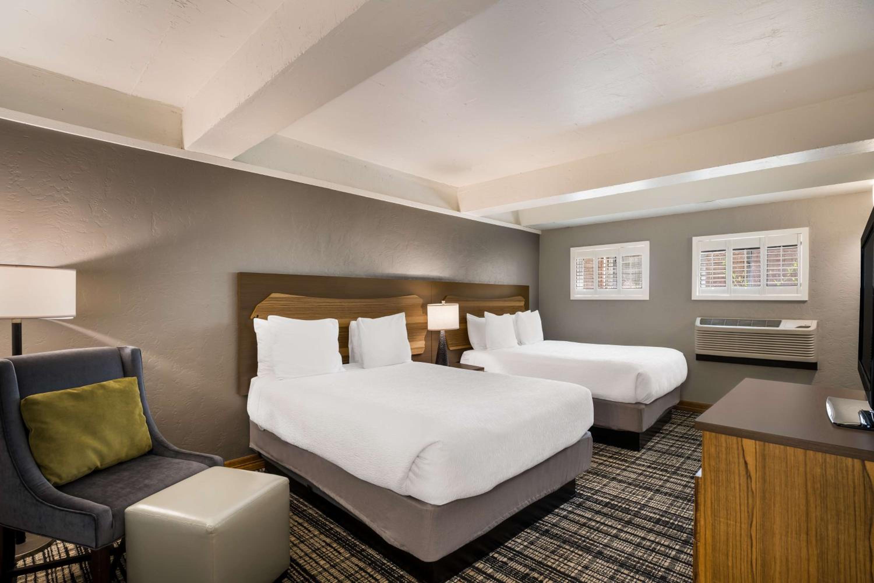 Queen Suite with Four Queen Beds and Sofa Bed photo 1