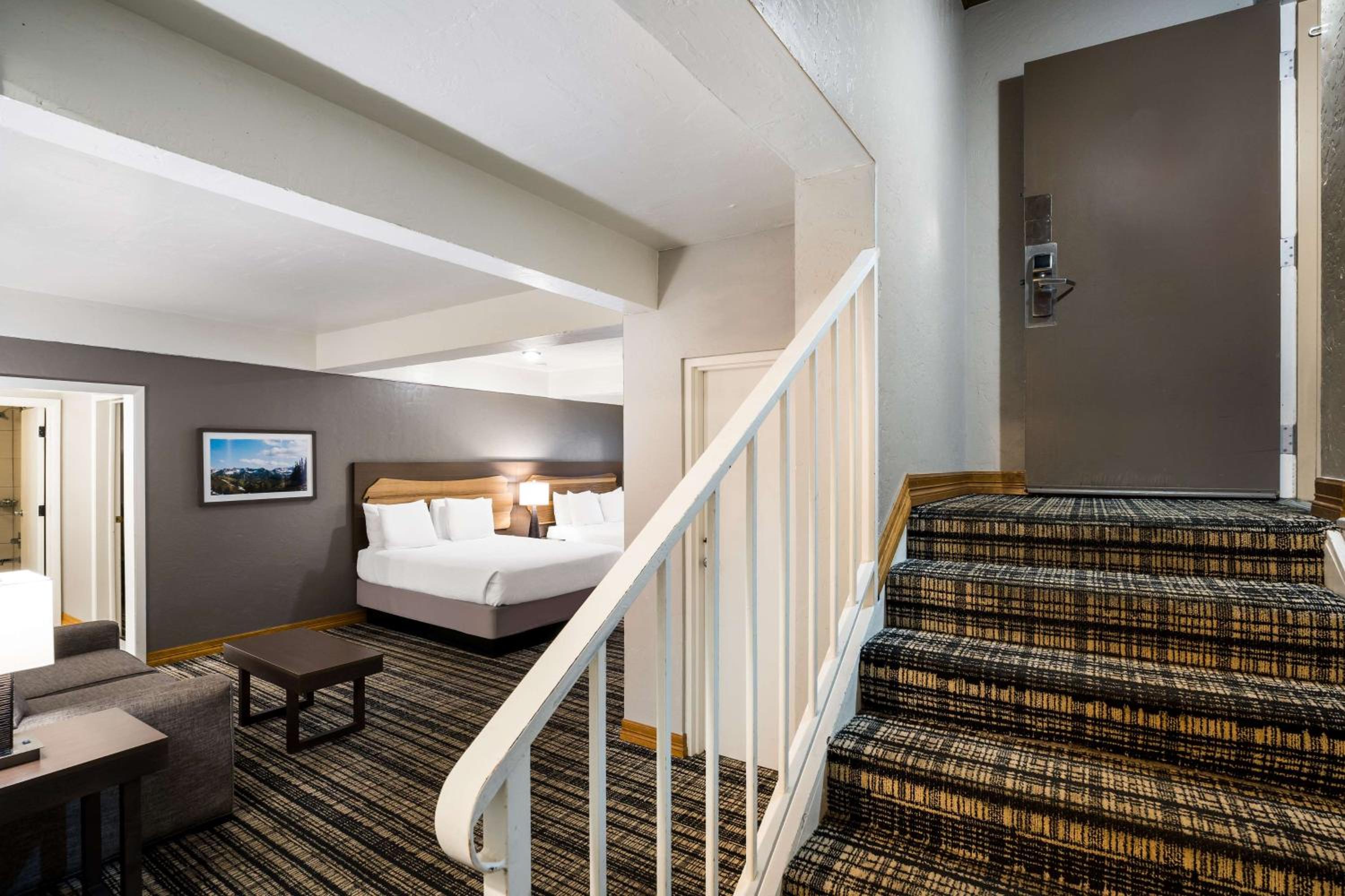 Queen Suite with Four Queen Beds and Sofa Bed photo 3