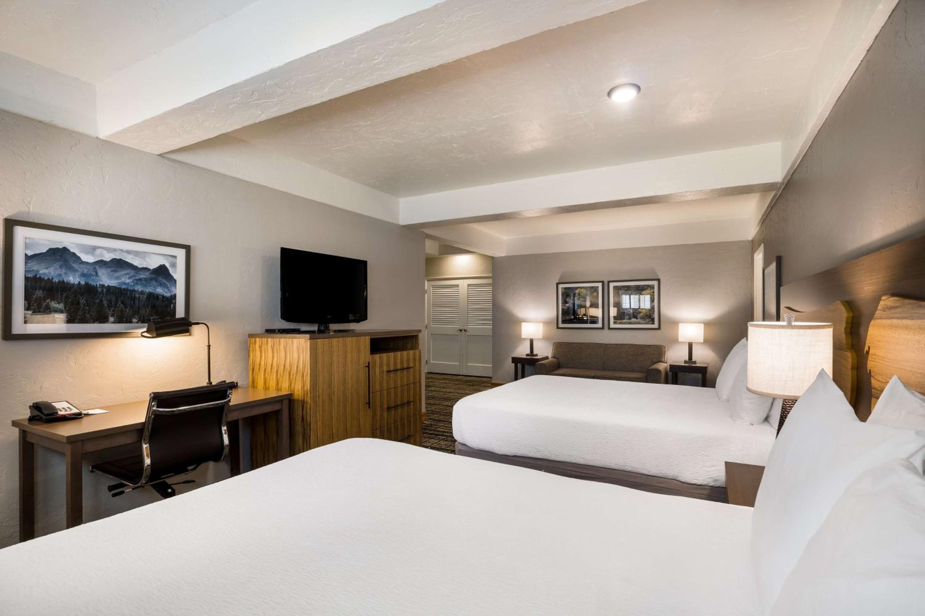 Queen Suite with Four Queen Beds and Sofa Bed photo 2