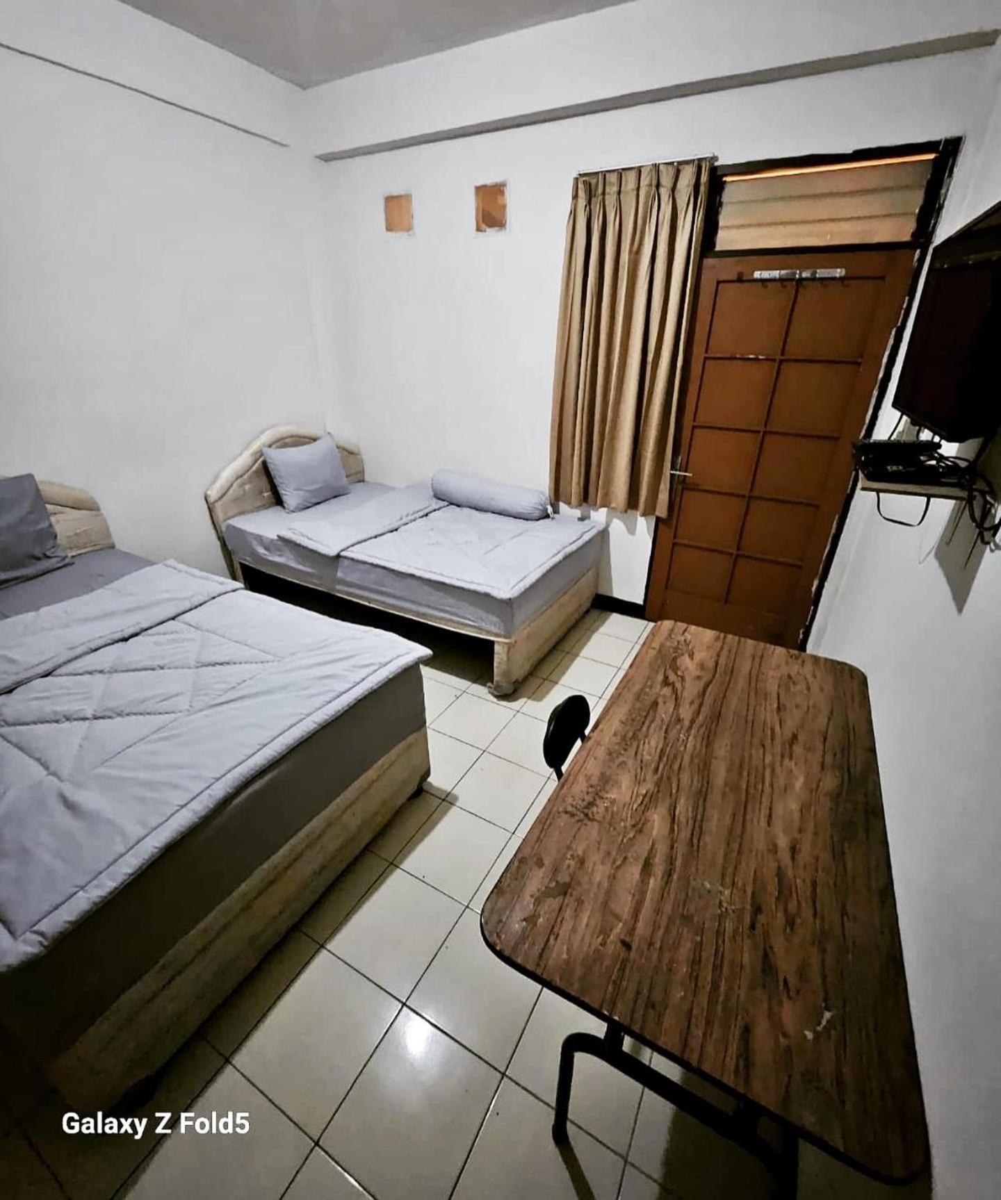 Budget Twin Room - Photo 1