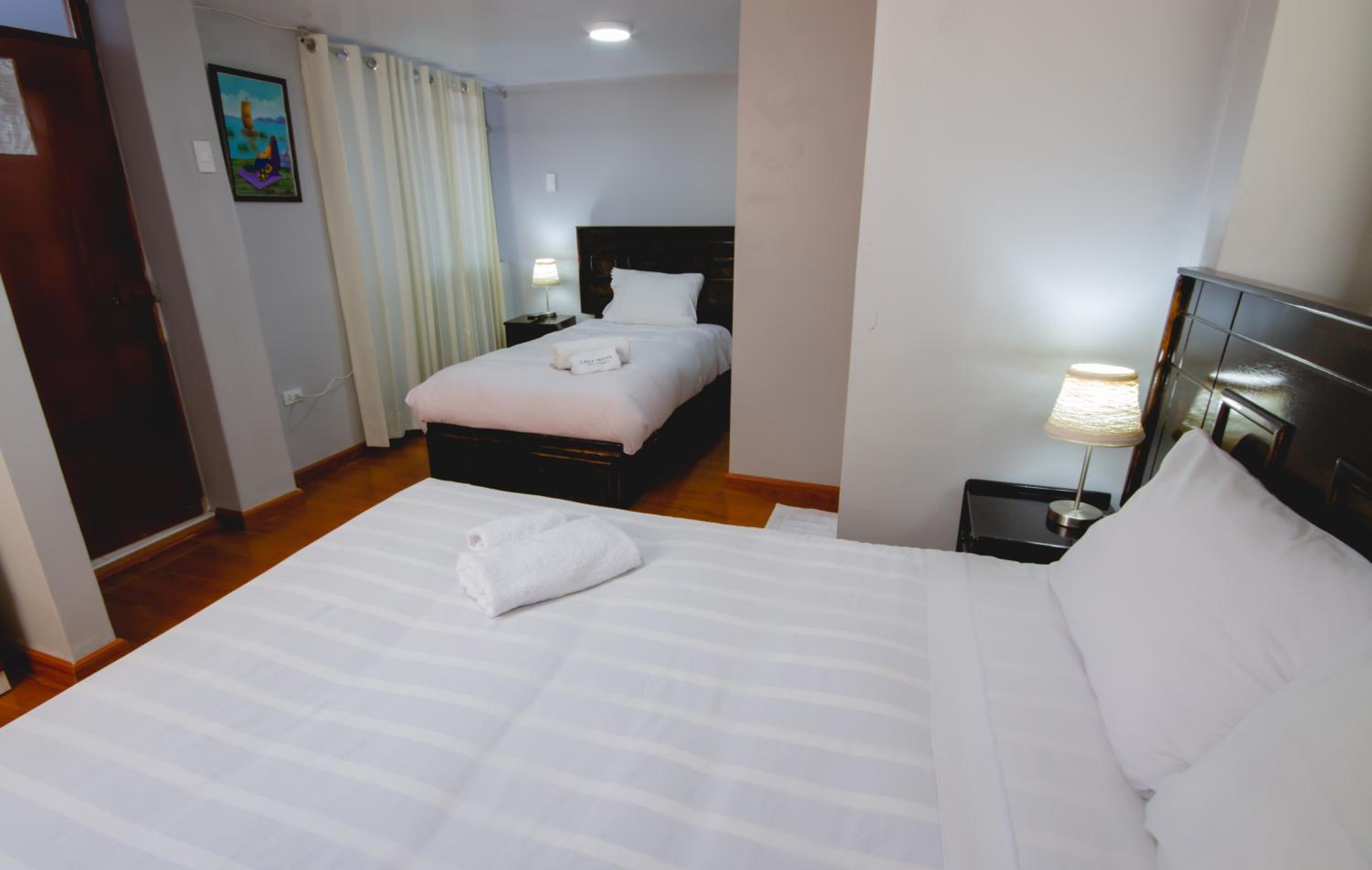 Deluxe Room (2 Adults + 1 Child) - Photo 2
