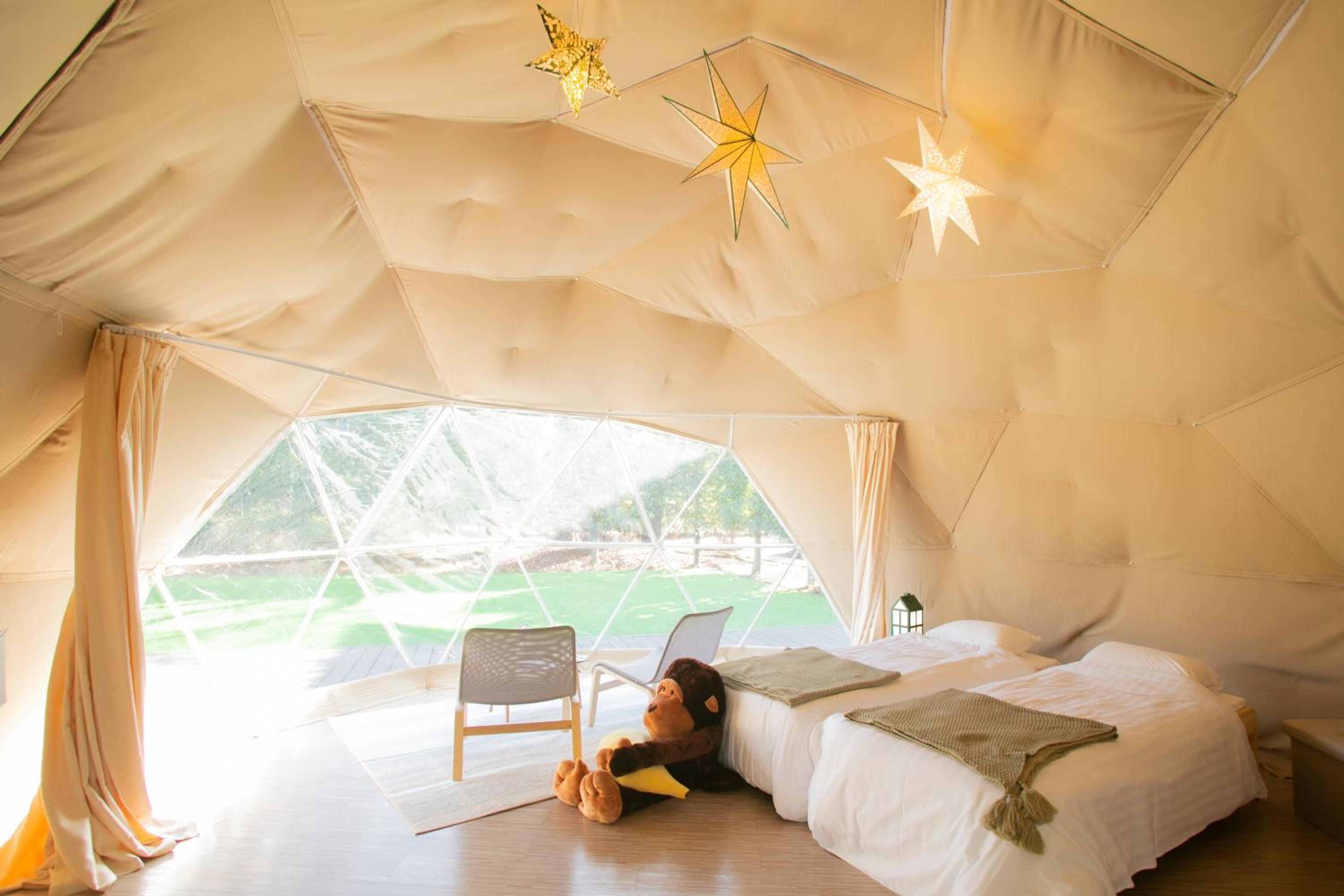 Glamping Dome with a cute big stuffed animal photo 3