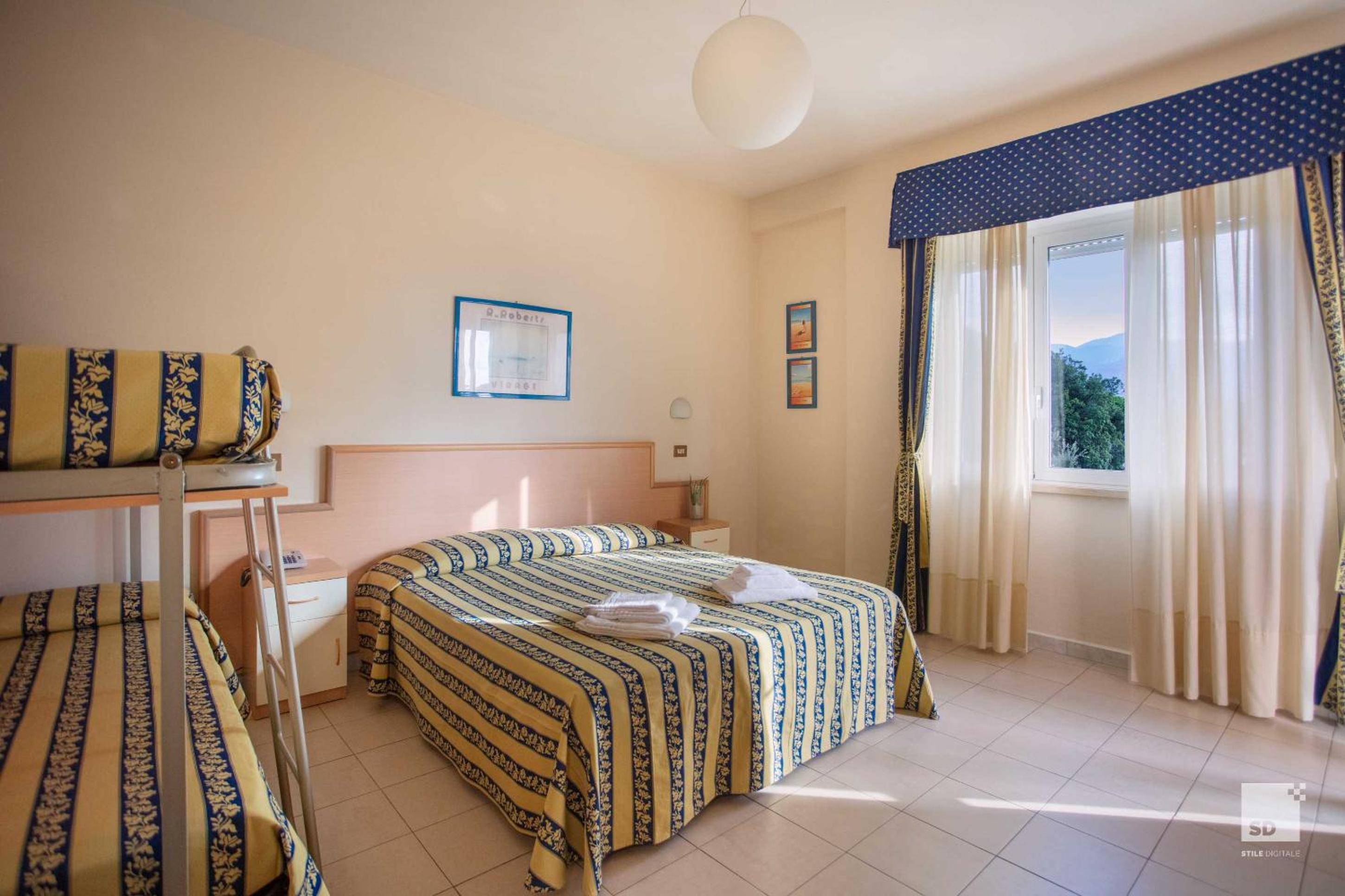 Family Room with Balcony (2 Adults + 2 Children) photo 1