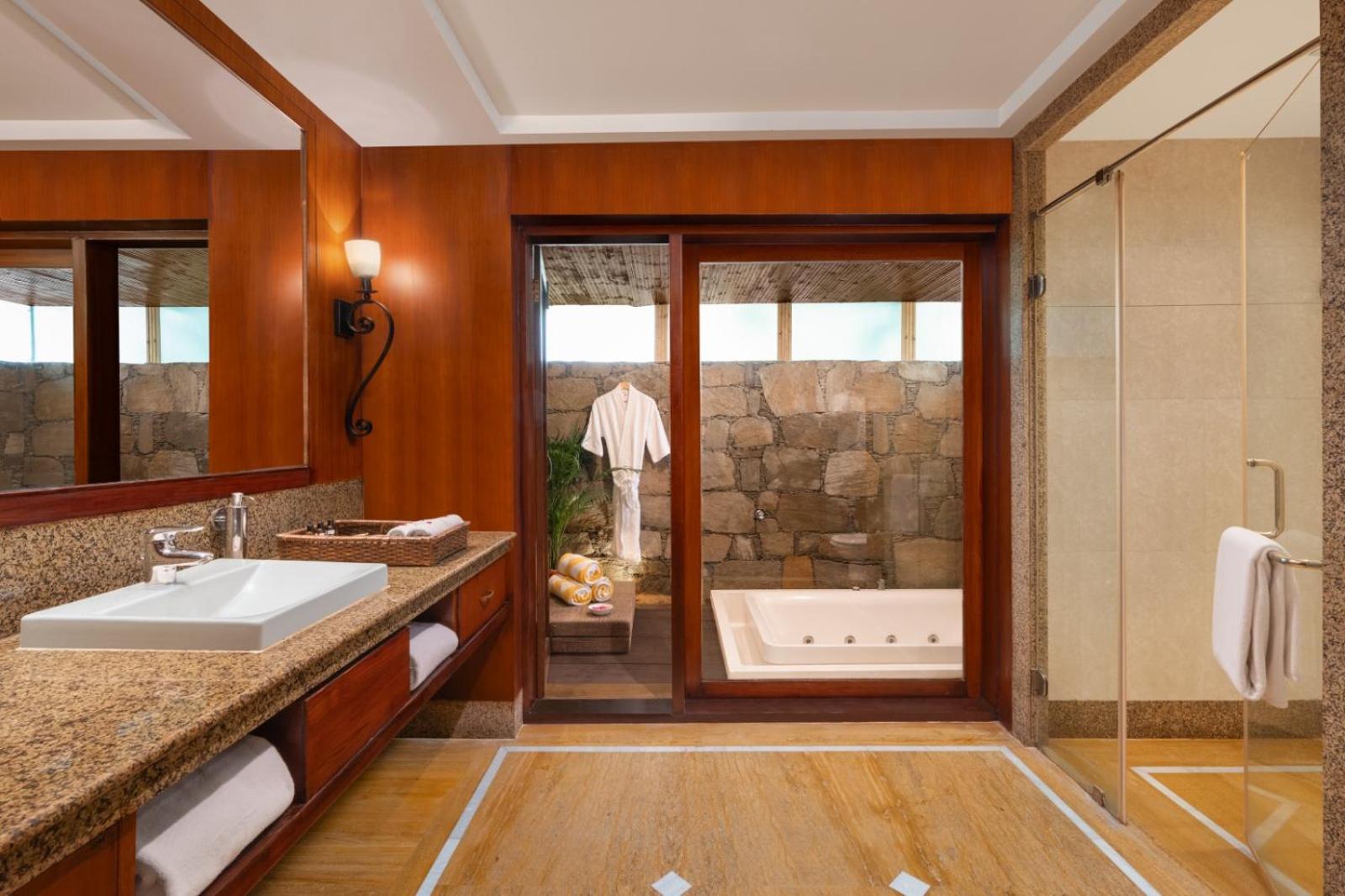 Premium Cottage with Jacuzzi:10% discount on Food & Beverages (excluding In-Room Dining and Liquor), 10% discount on Spa Services, Laundry Services, Complimentary Happy Hour Offer – Buy 1 Get 1 Free, available daily from 11:00 AM to 7:00 PM. - Photo 5