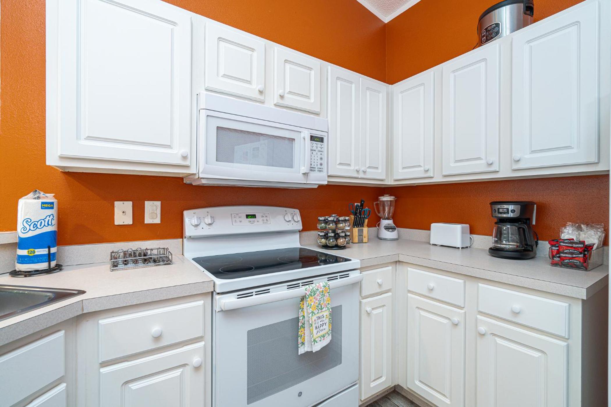 Three-Bedroom House - Photo 40