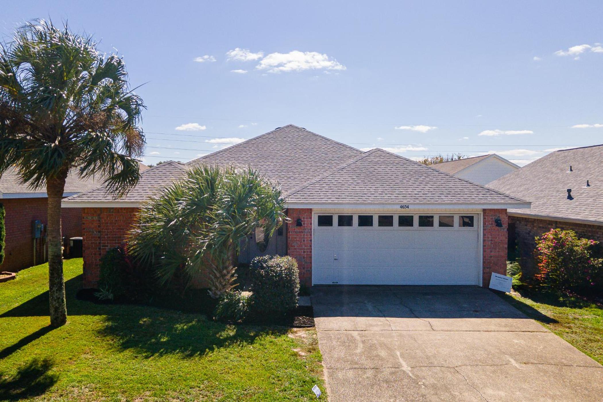 Three-Bedroom House - Photo 24