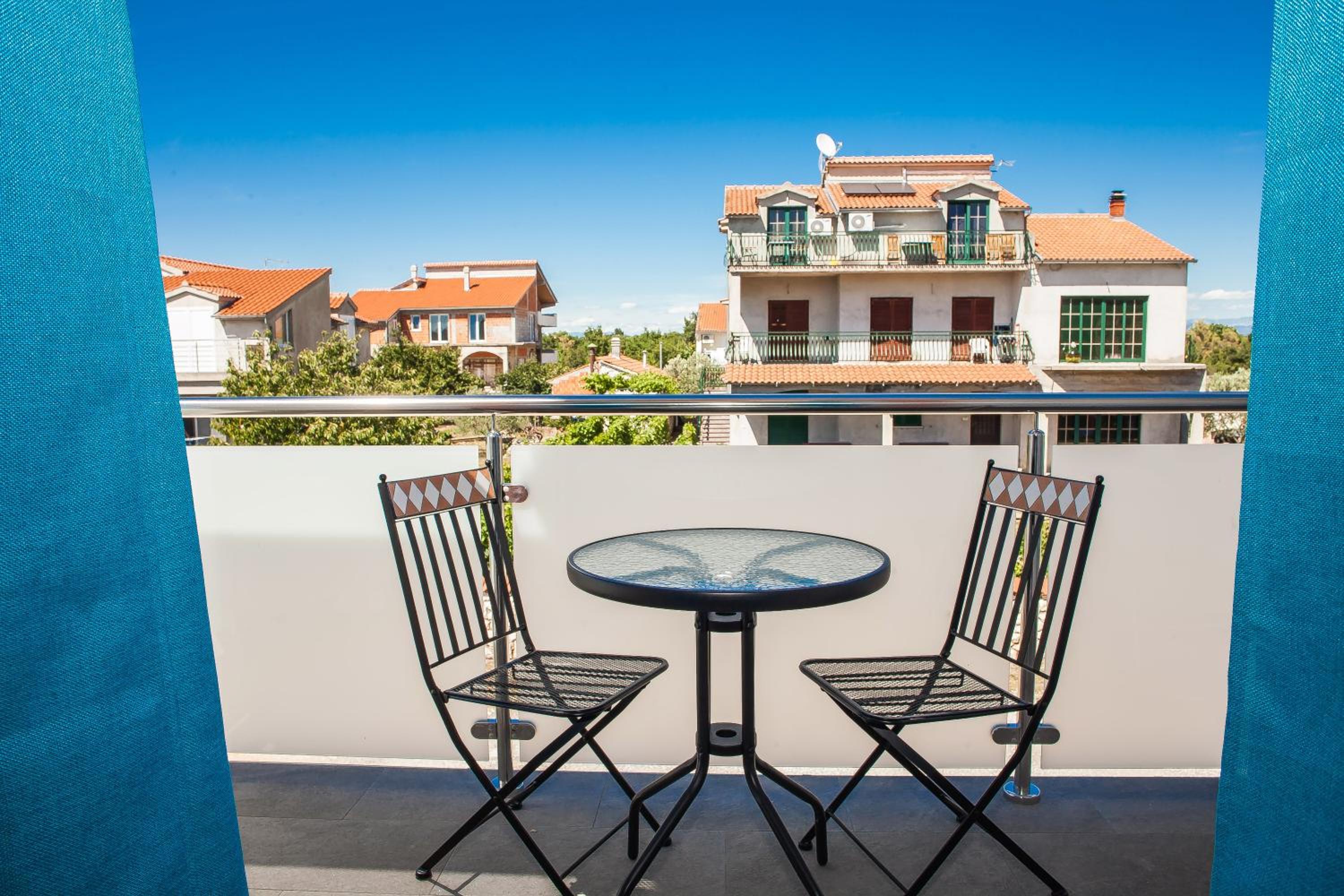 Deluxe Double Room with Balcony - Photo 14