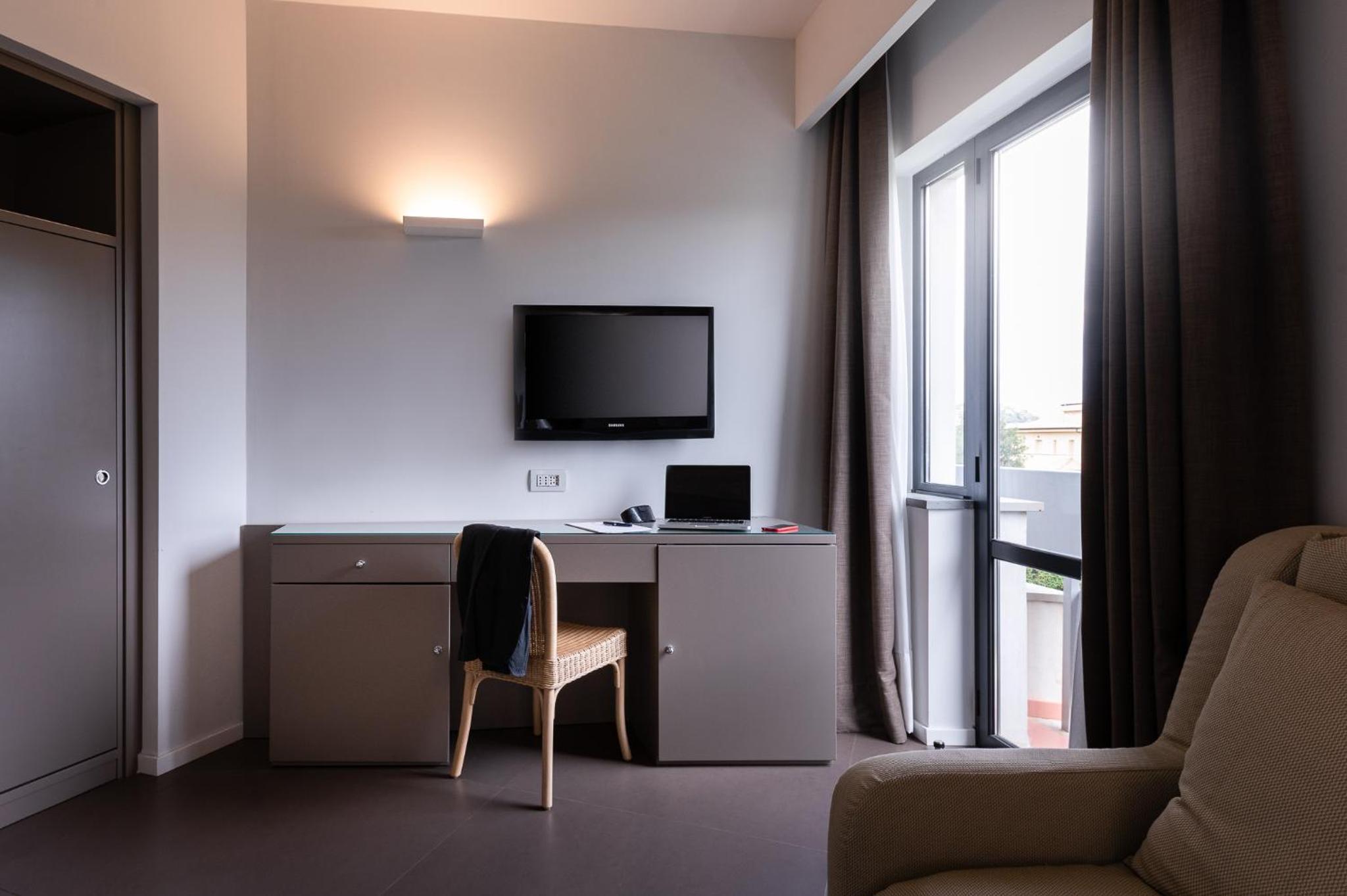 Deluxe Quadruple Room - Photo 1