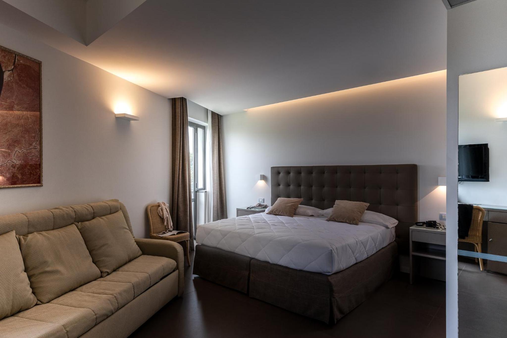 Deluxe Quadruple Room - Photo 8