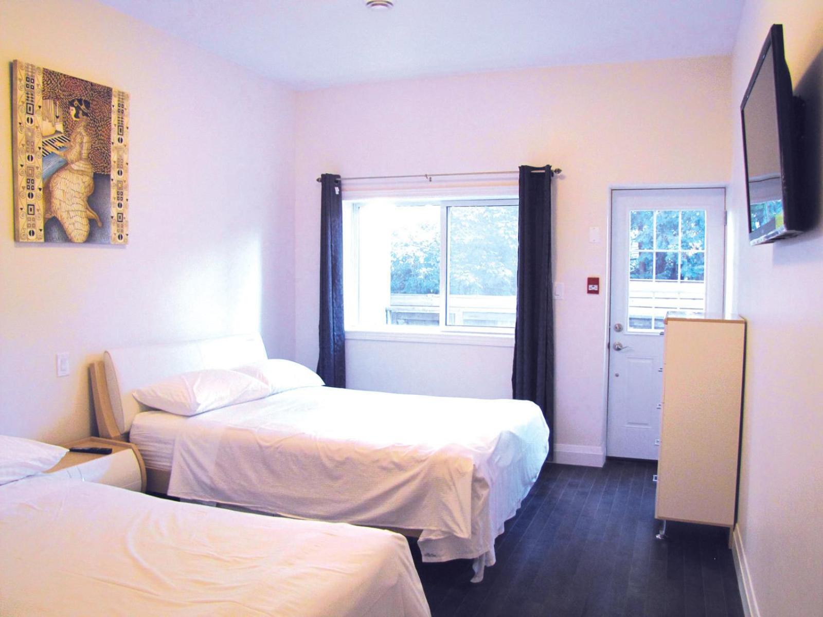 Deluxe Suite with Two Queen Beds - Photo 2