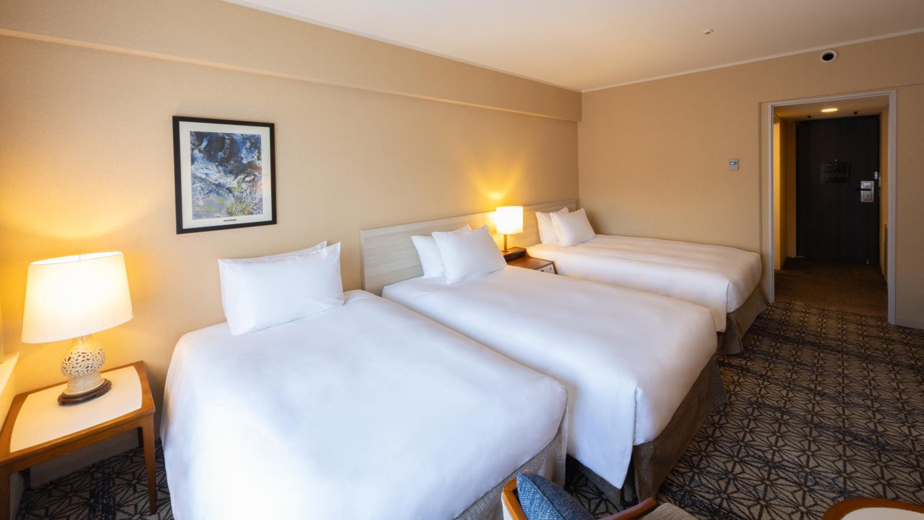 Deluxe Twin Room with Extra Bed Non-Smoking - Garden View Deluxe Twin Room with Extra Bed Non-Smoking - Garden View