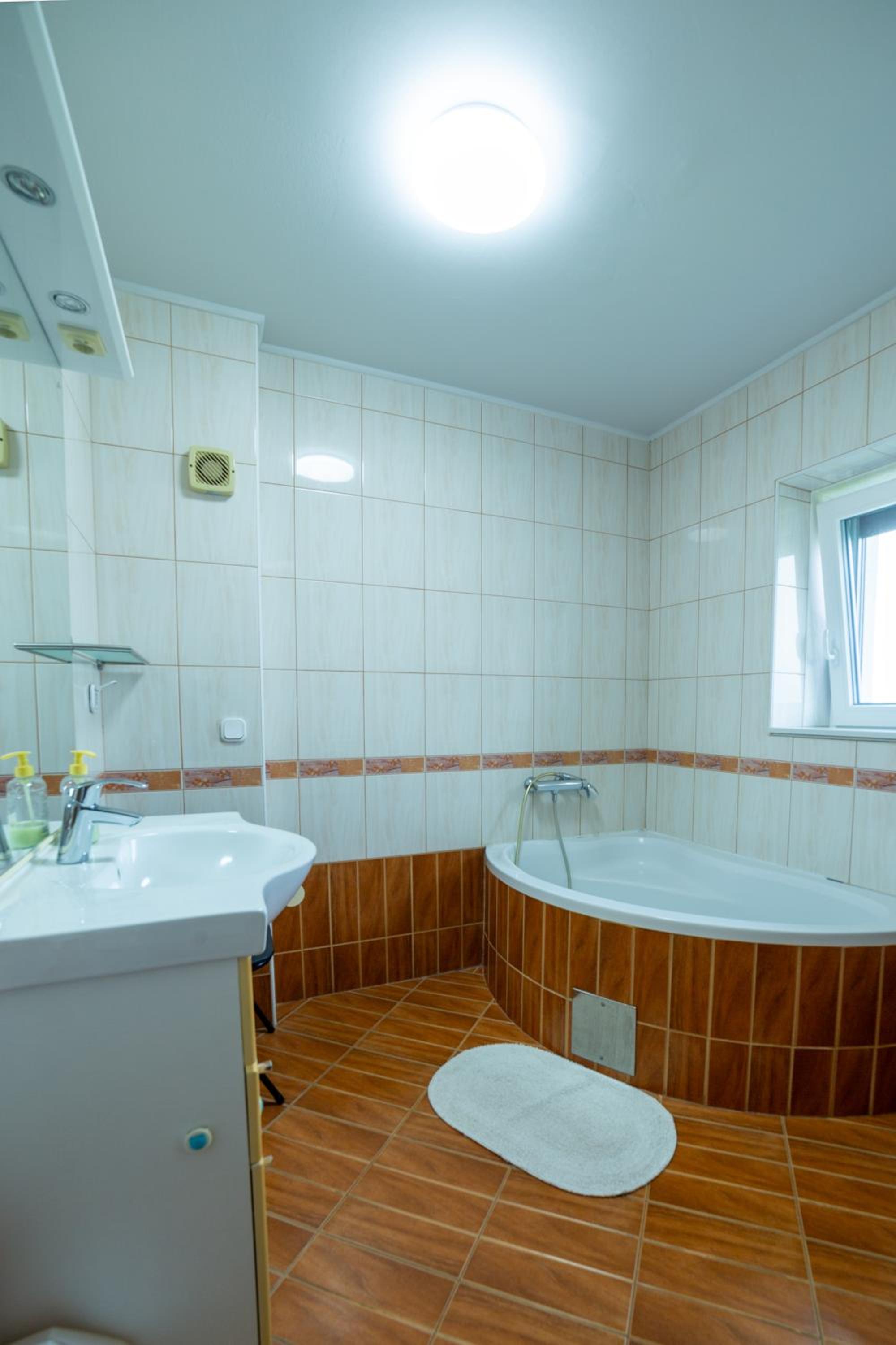 Three-Bedroom Apartment - Photo 7